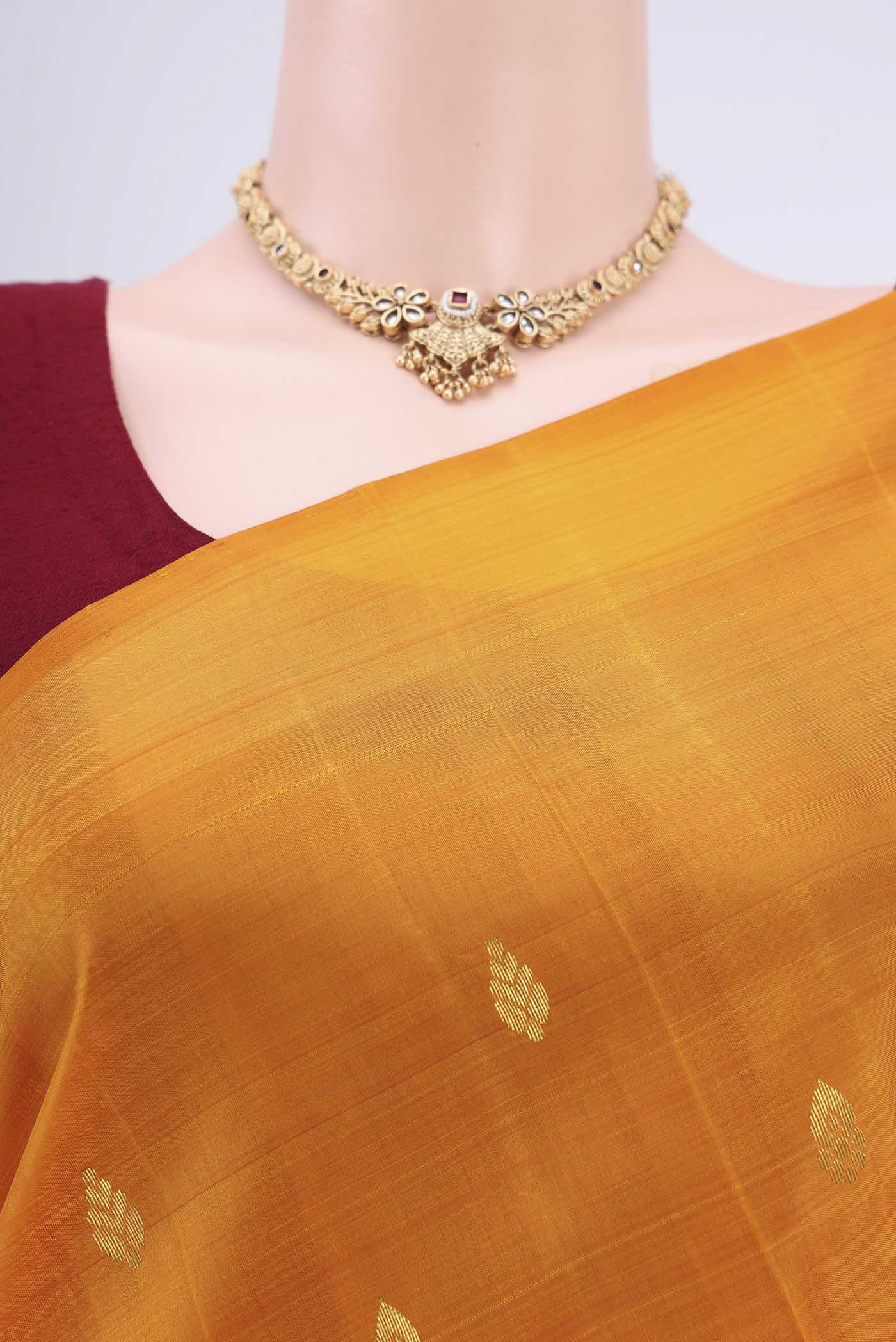 Border image of Yellow Dual Tone Kanjivaram Silk Saree with Zari Butta on the body and One Side Border. 