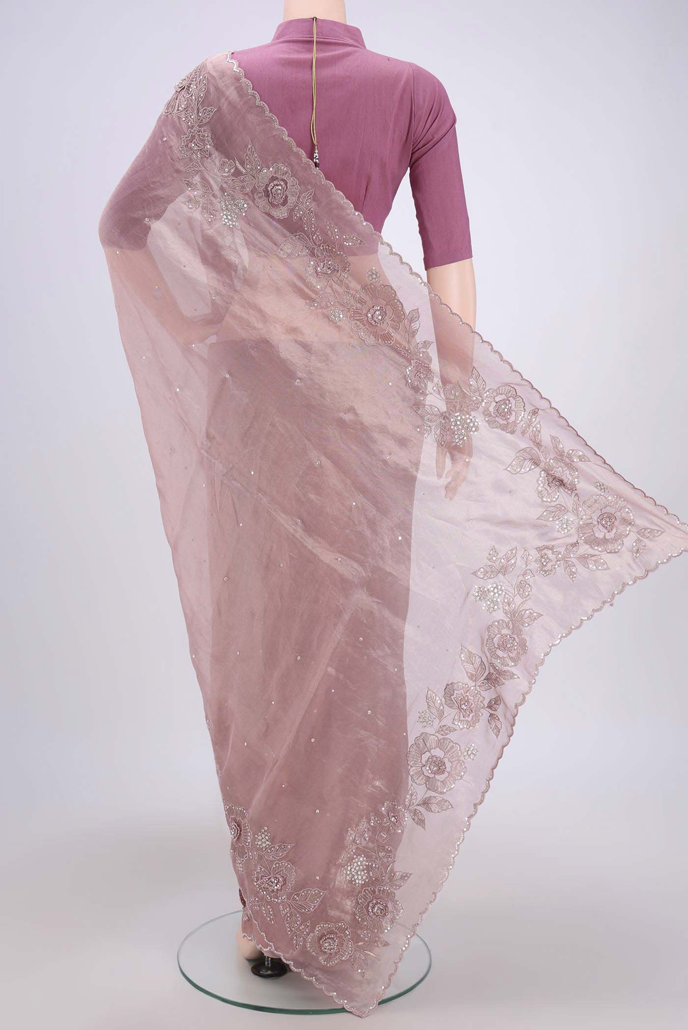 Flat view of Coral Organza Silk Saree with Embroidery on the body and Embroidery Border. 