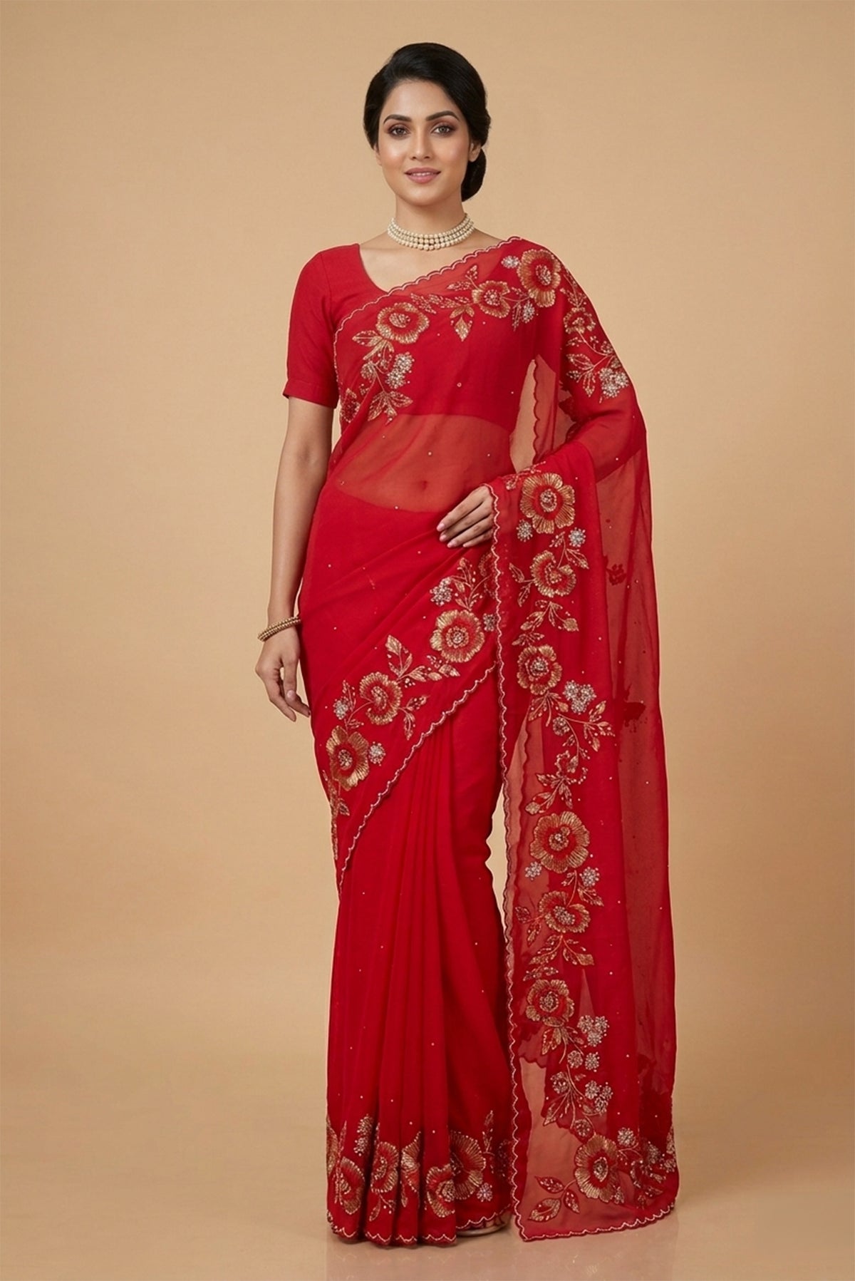 Model wearing a Red Organza Silk Saree with Embroidery on the body and Embroidery Border.