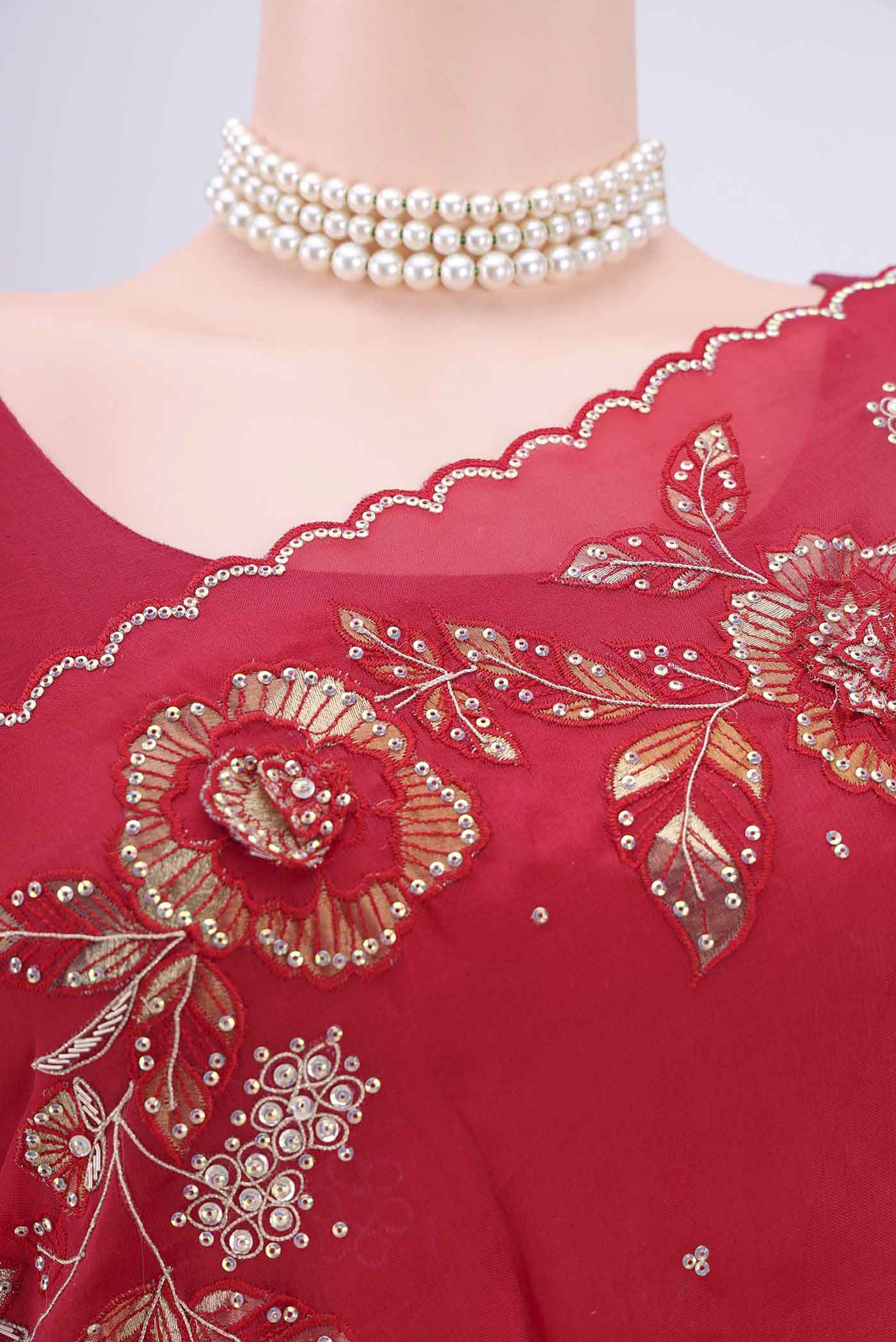 Border image of Red Organza Silk Saree with Embroidery on the body and Zari Border. 