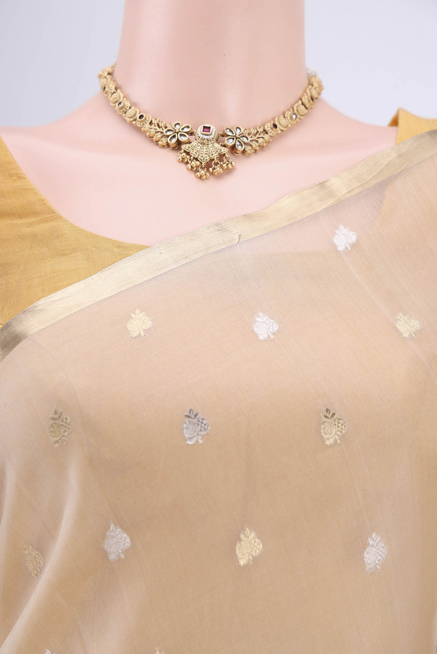 Border image of Beige Banarasi Katan Silk Saree with Zari Butta on the body and Zari Border. 