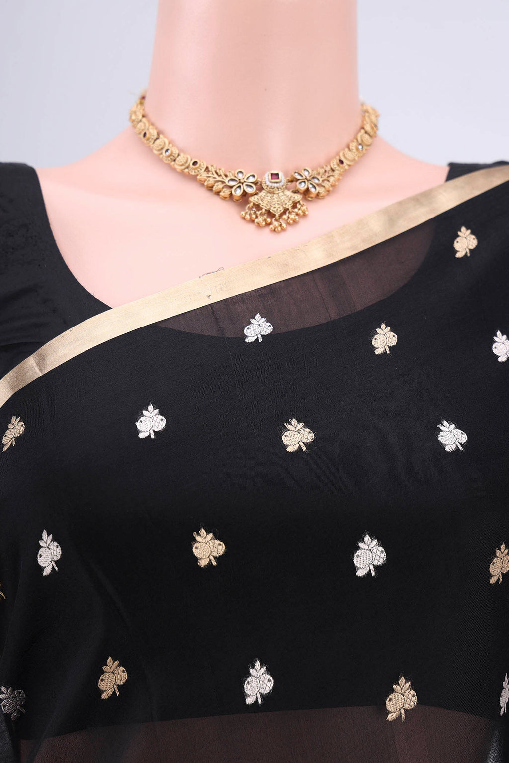 Border image of Black Banarasi Katan Silk Saree with Zari Butta on the body and Zari Border. 