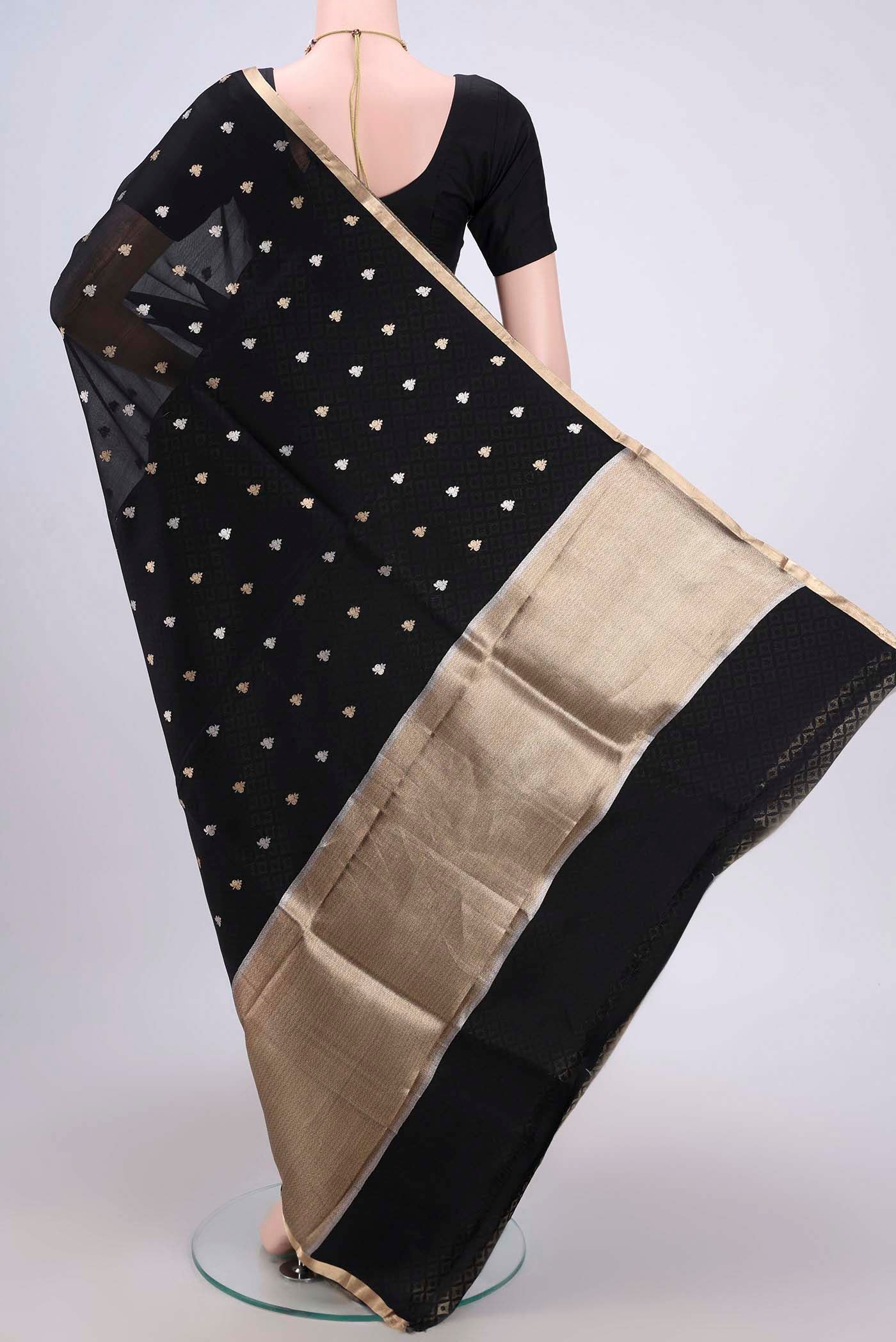 Flat view of Black Banarasi Katan Silk Saree with Zari Butta on the body and Zari Border. 