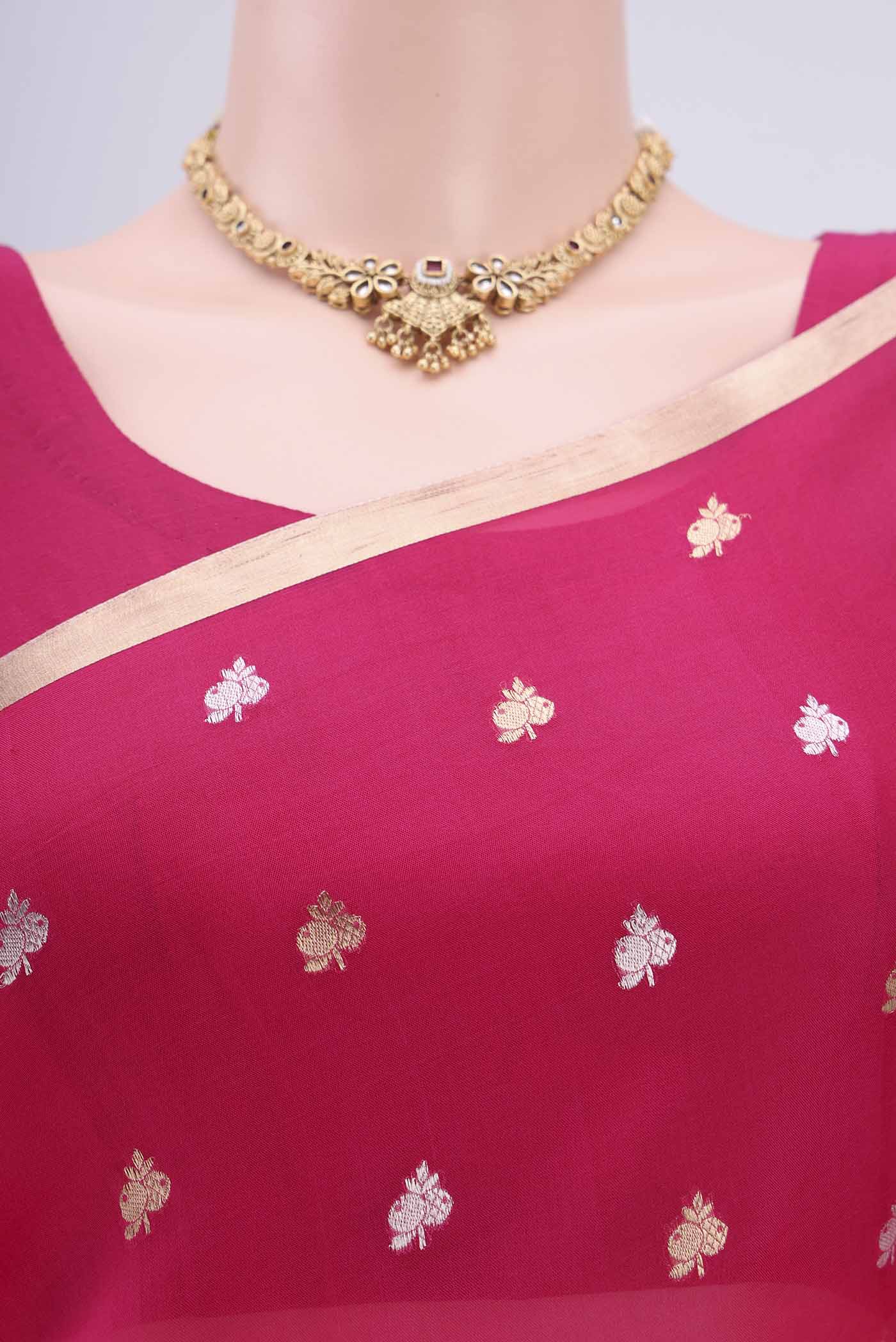 Border image of Dark Pink Organza Silk Saree with Zari Butta on the body and Zari Border. 