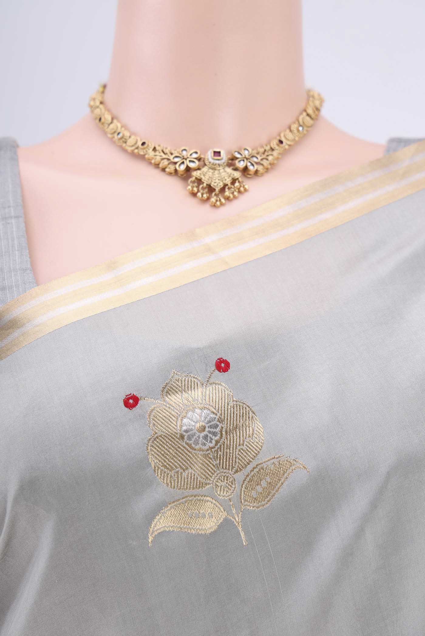 Border image of Davys Grey Banarasi Katan Silk Saree with Zari Butta on the body and Zari Border. 