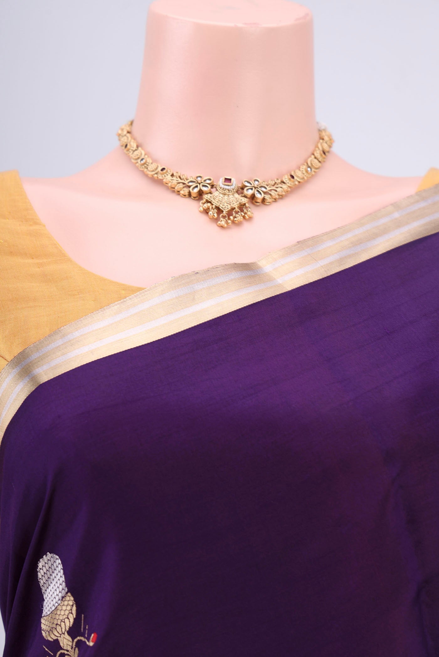 Border image of Purple Banarasi Katan Silk Saree with Zari Butta on the body and Thin Zari Line. 