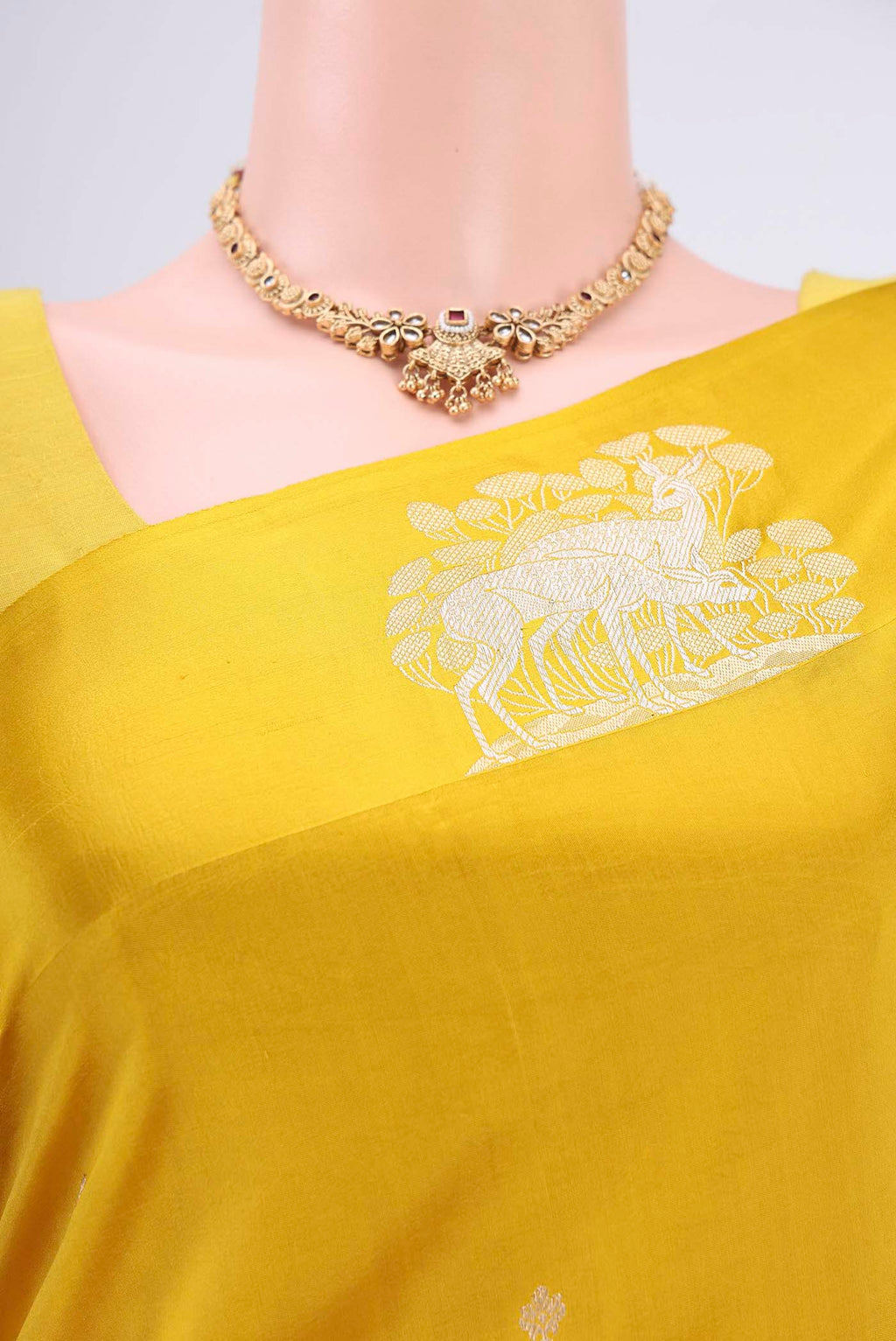 Border image of Yellow Banarasi Katan Silk Saree with Zari Butta on the body and Zari Border. 