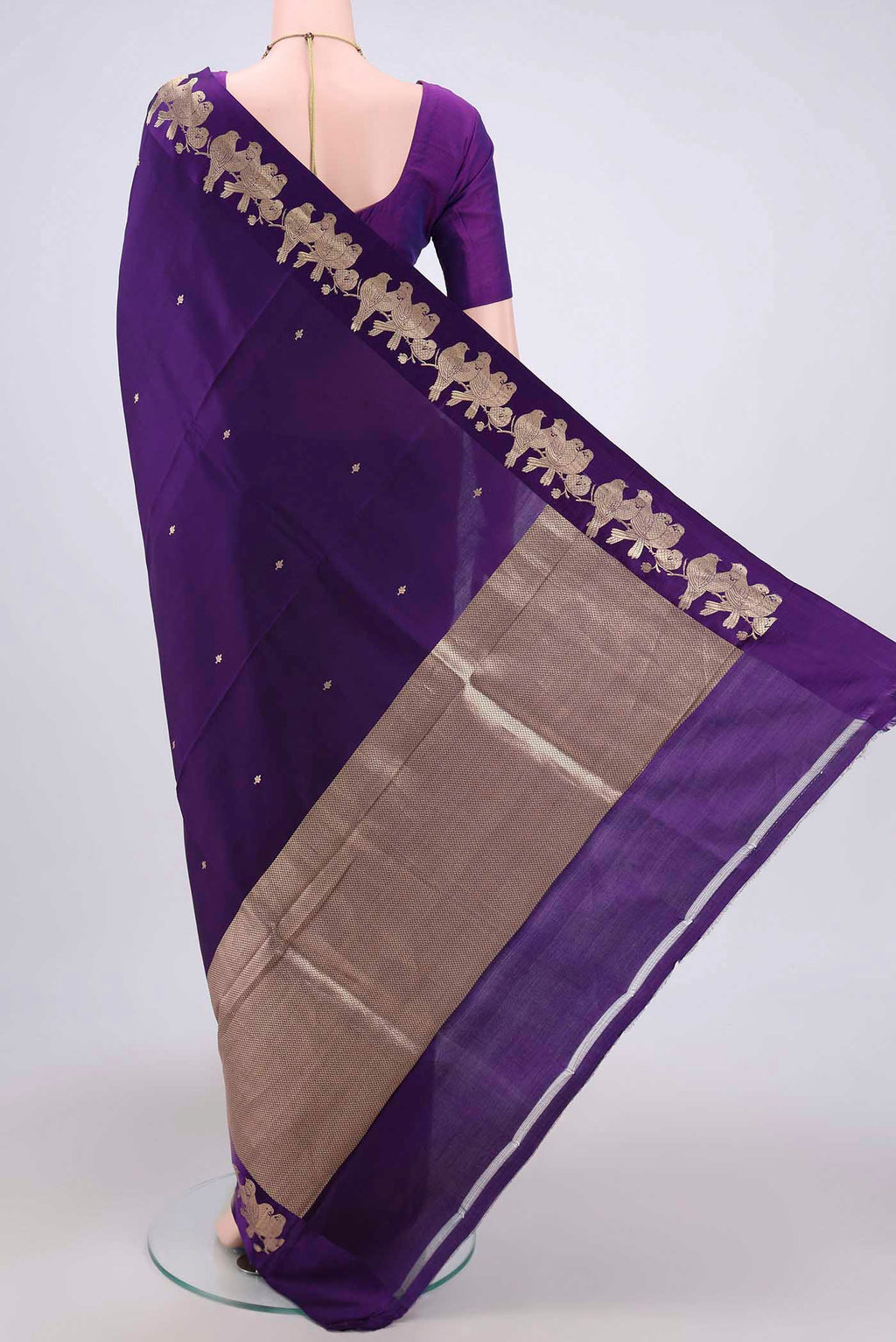 Flat view of Purple Banarasi Katan Silk Saree with Zari Butta on the body and Zari Border. 