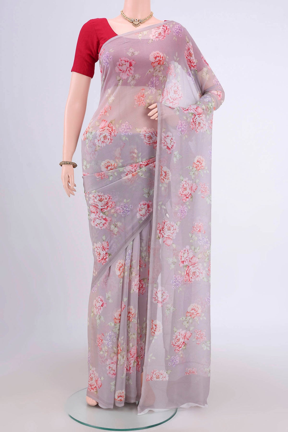 Davys Grey Mysore Chiffon Saree with Floral Print on the body and Without Border.  displayed on a mannequin