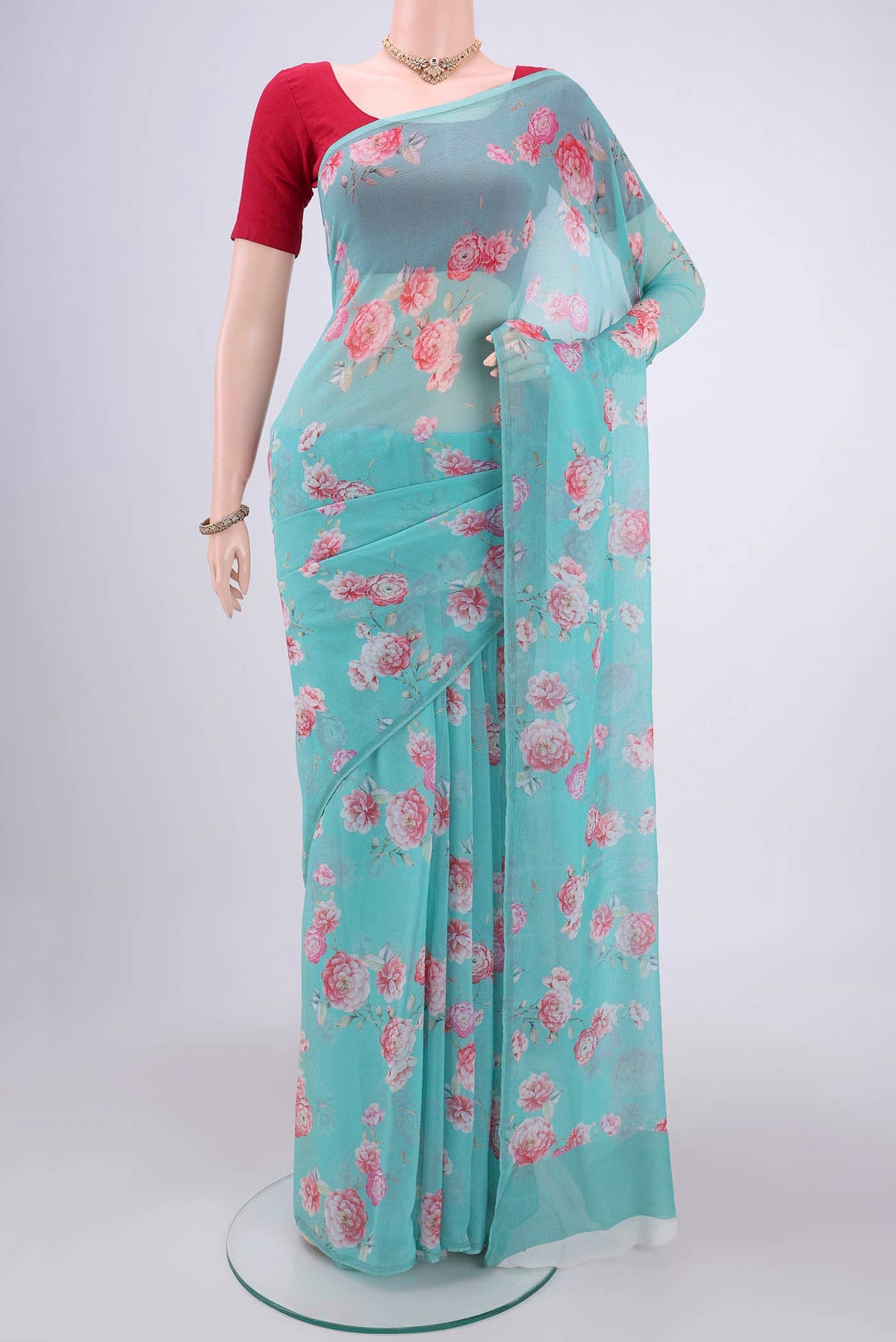 Sky Blue Mysore Chiffon Saree with Floral Print on the body and Without Border.  displayed on a mannequin