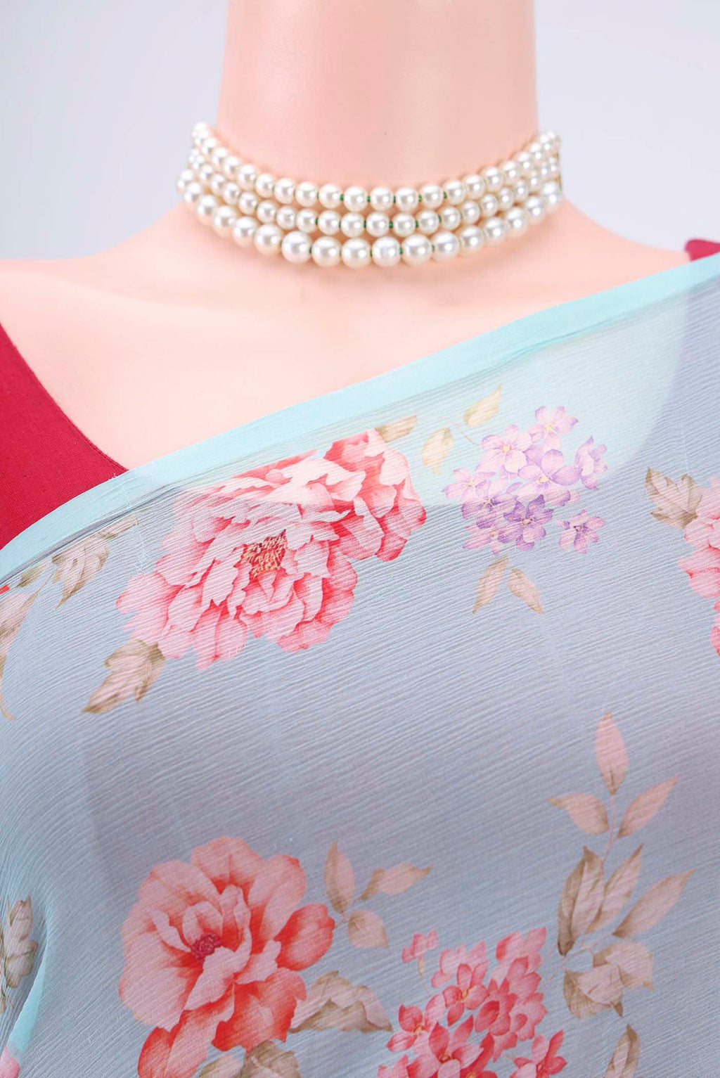 Border image of Sky Blue Mysore Chiffon Saree with Floral Print on the body and Without Border. 