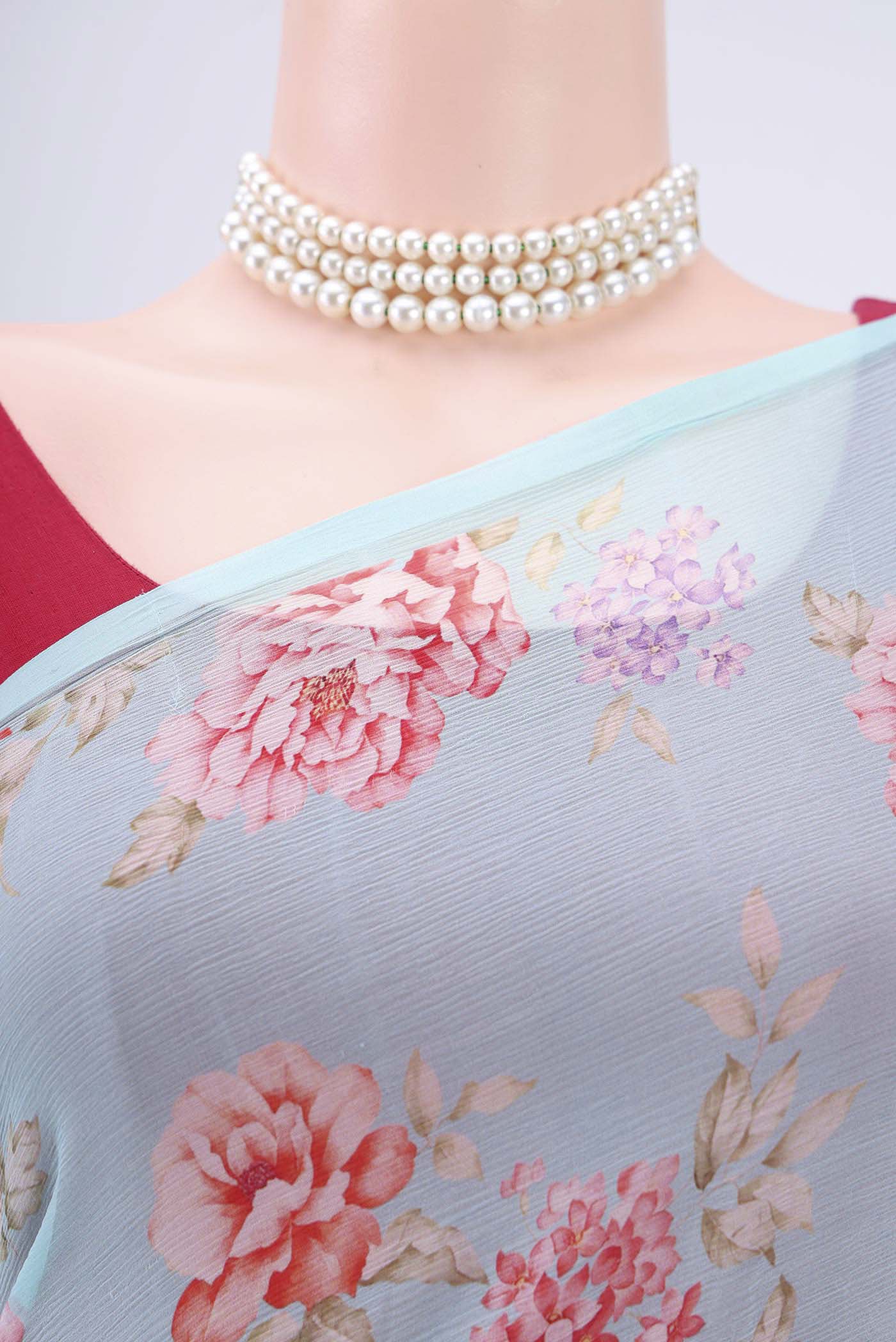 Border image of Sky Blue Mysore Chiffon Saree with Floral Print on the body and Without Border. 