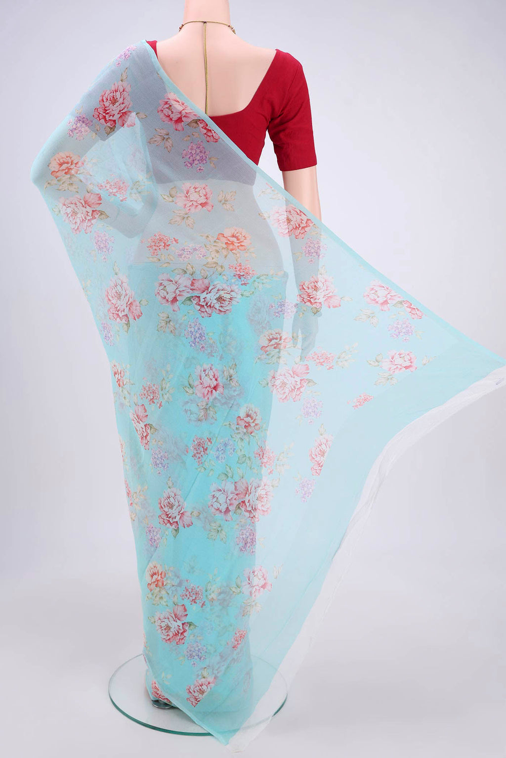 Flat view of Sky Blue Mysore Chiffon Saree with Floral Print on the body and Without Border. 
