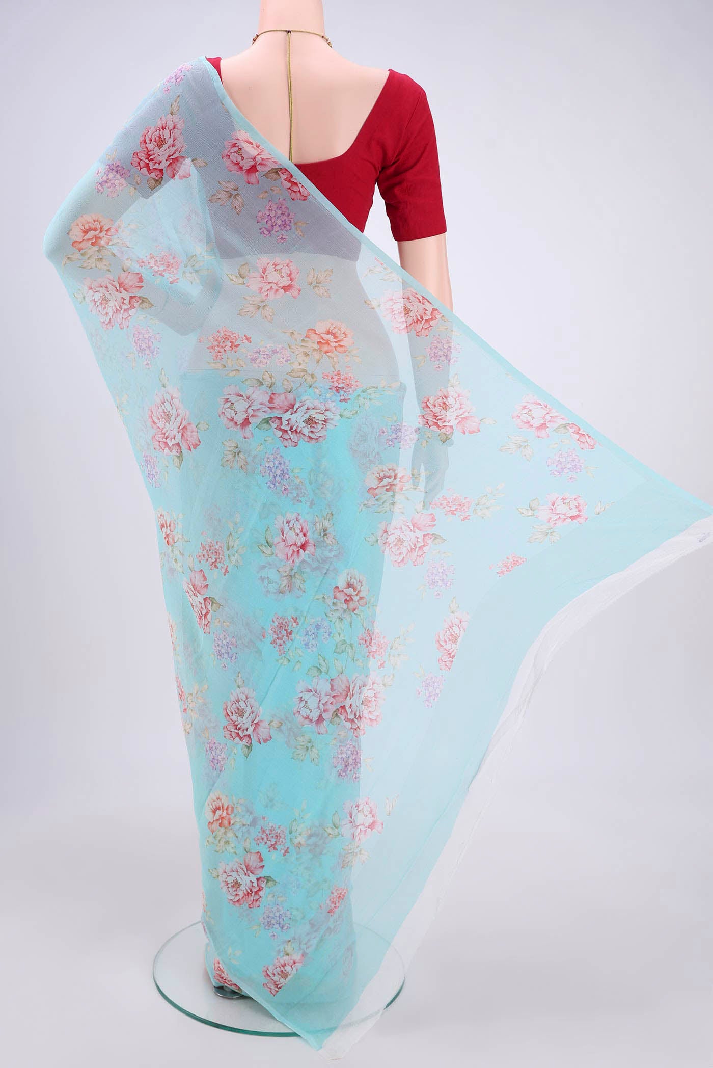 Flat view of Sky Blue Mysore Chiffon Saree with Floral Print on the body and Without Border. 