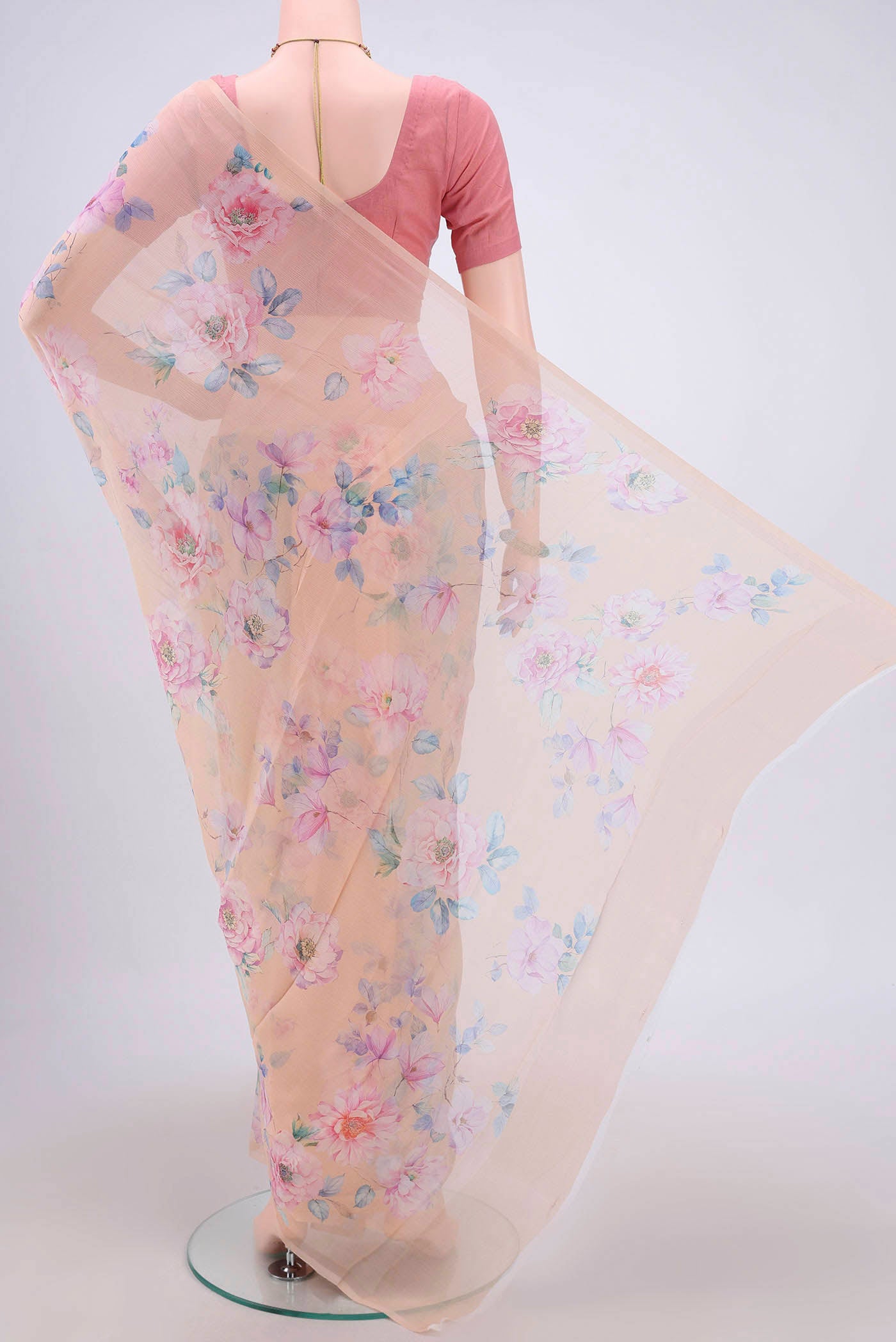 Flat view of Peach Mysore Chiffon Saree with Floral Print on the body and Without Border. 