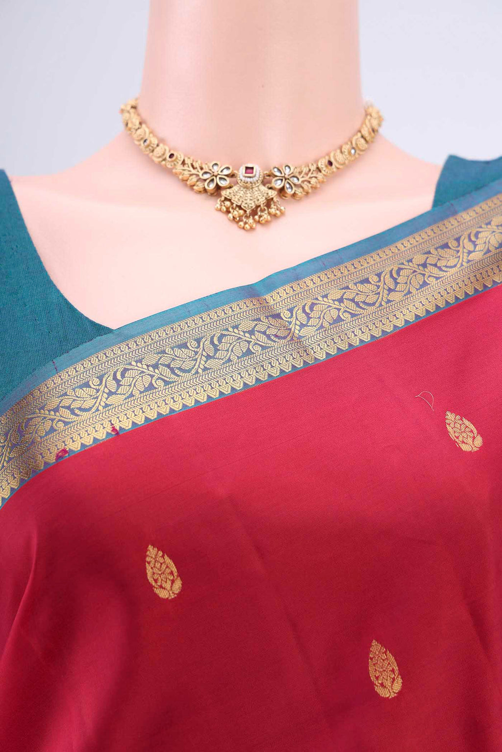Border image of Maroon Dual Tone Kanjivaram Saree with Zari Butta on the body and Zari Border. 