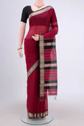 Dark Pink Maheshwari Silk Cotton Saree with Plain Body and Zari Border.  displayed on a mannequin
