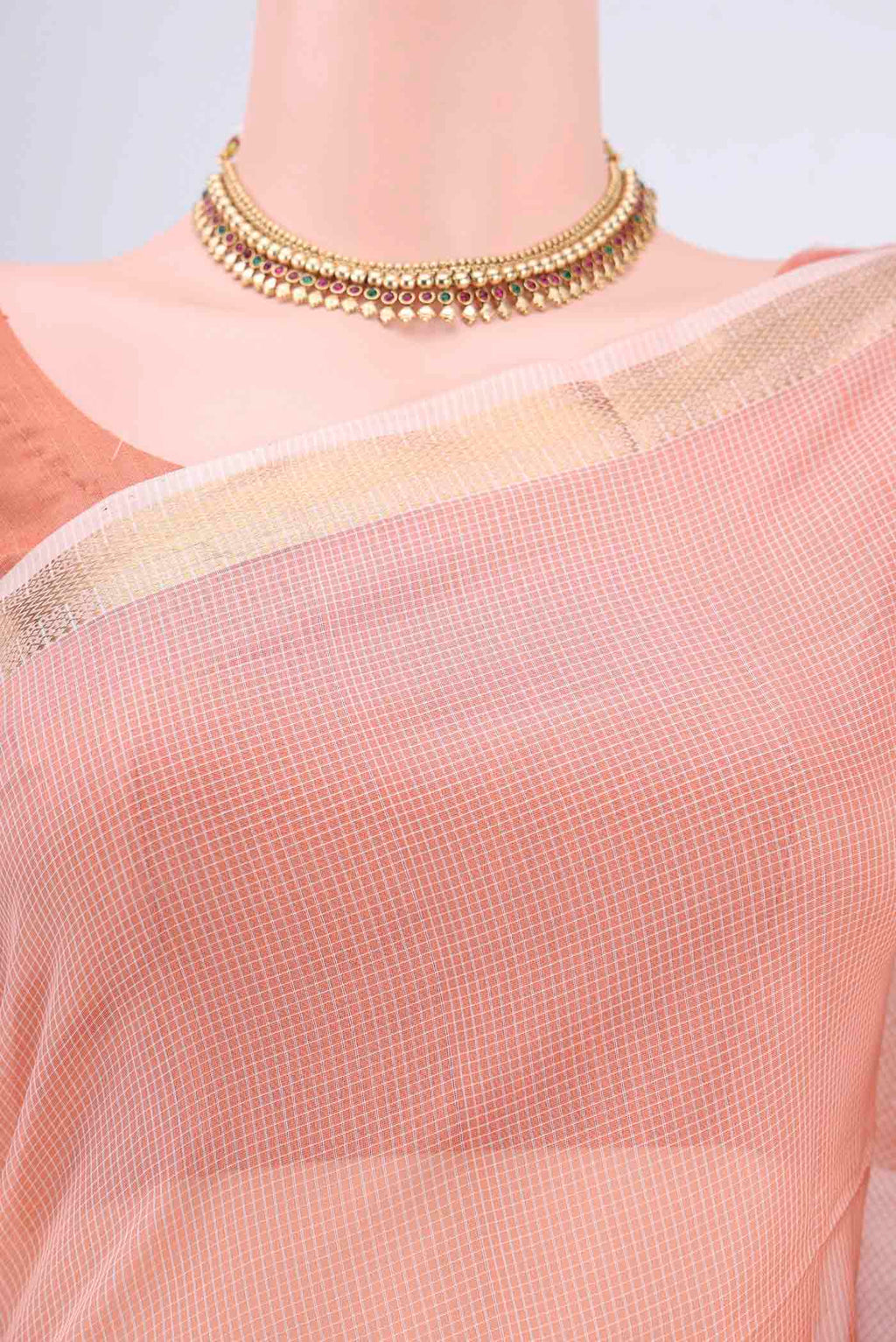 Border image of Peach Maheshwari Silk Cotton Saree with Plain Body and Zari Border. 