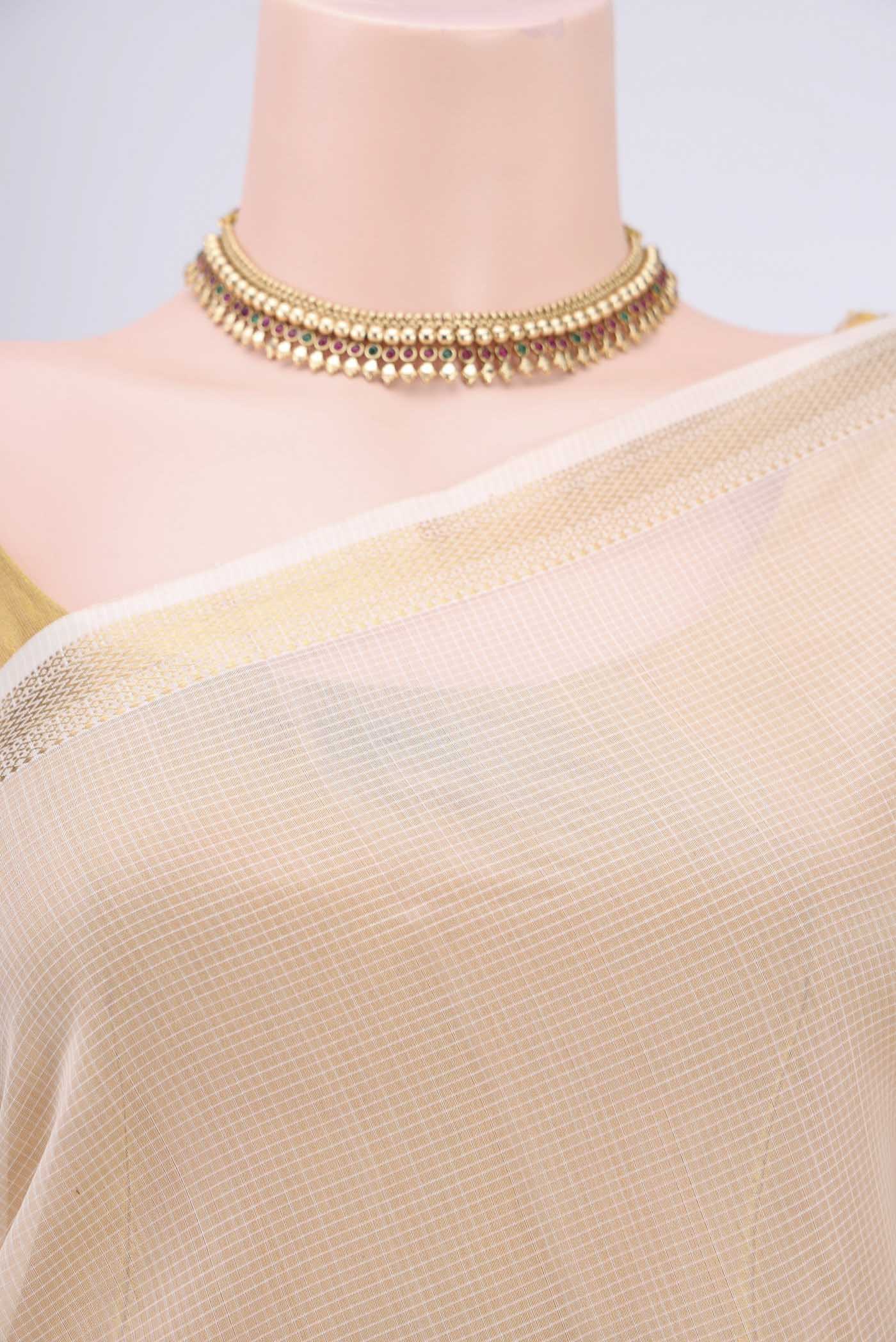 Border image of Off White Maheshwari Silk Cotton Saree with Plain Body and Zari Border. 
