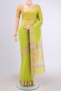 Parrot Green Maheshwari Silk Cotton Saree with Plain Body and Zari Border.  displayed on a mannequin