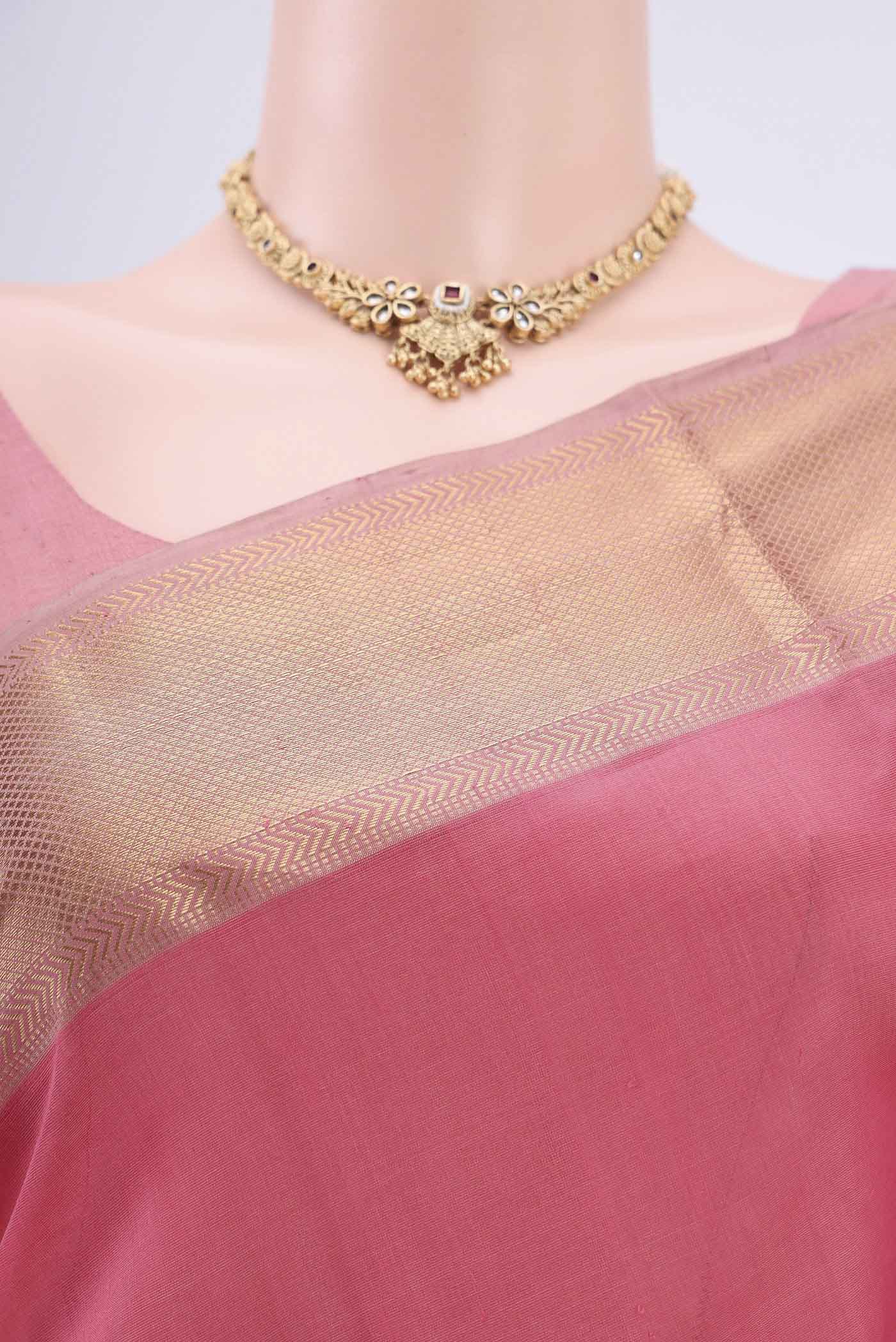 Border image of Peach Maheshwari Silk Cotton Saree with Plain Body and Zari Border. 