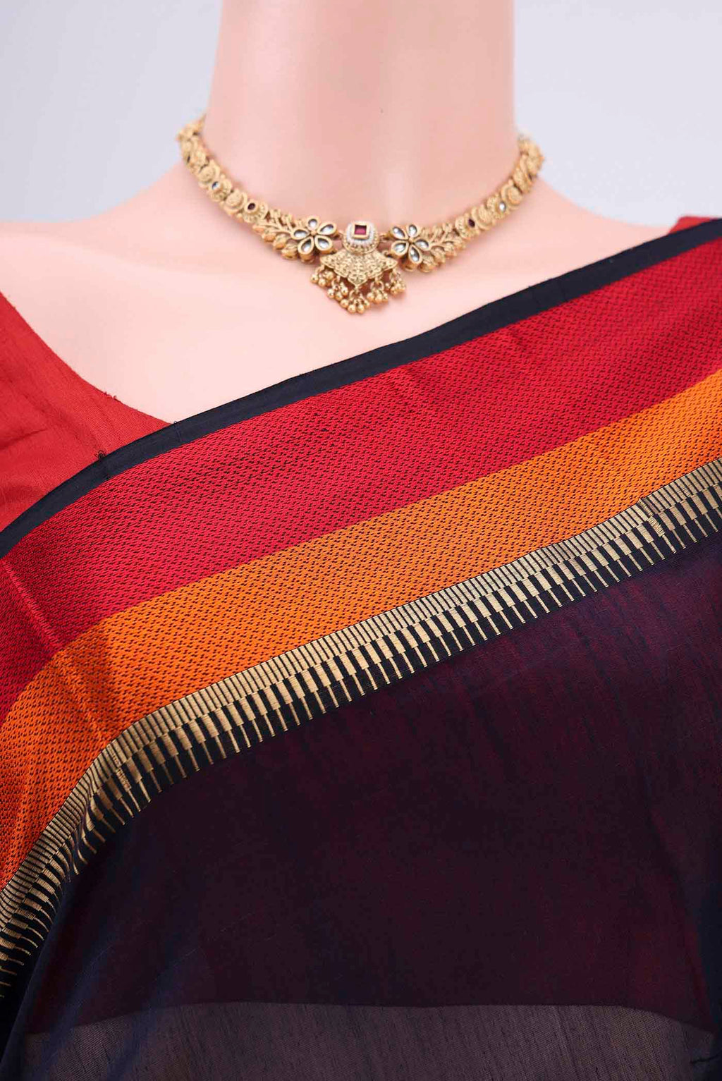 Border image of Navy Blue Maheshwari Silk Cotton Saree with Stripes on the body and Zari Border. 