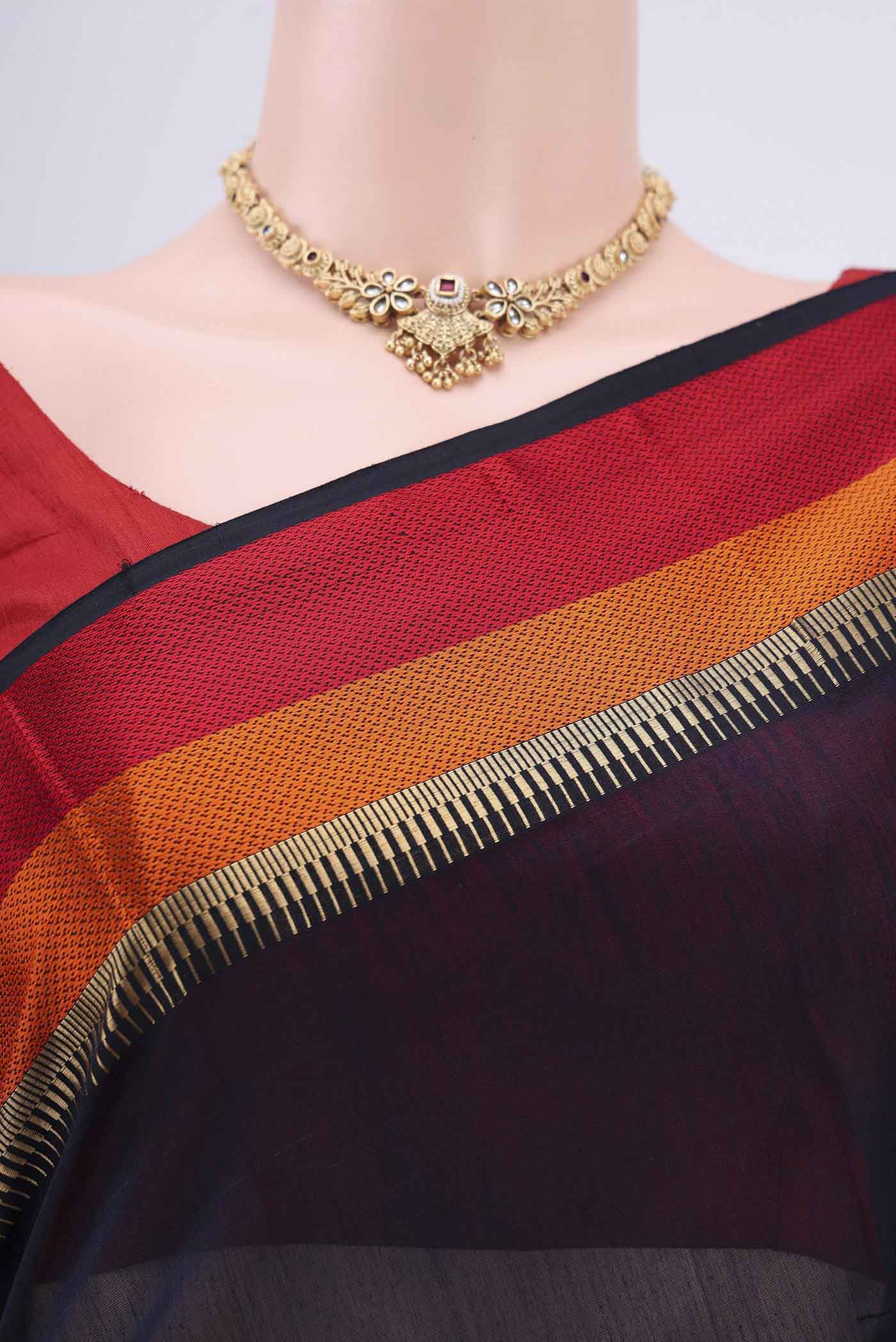 Border image of Navy Blue Maheshwari Silk Cotton Saree with Stripes on the body and Zari Border. 