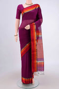 Magenta Maheshwari Silk Cotton Saree with Plain Body and Zari Border.  displayed on a mannequin