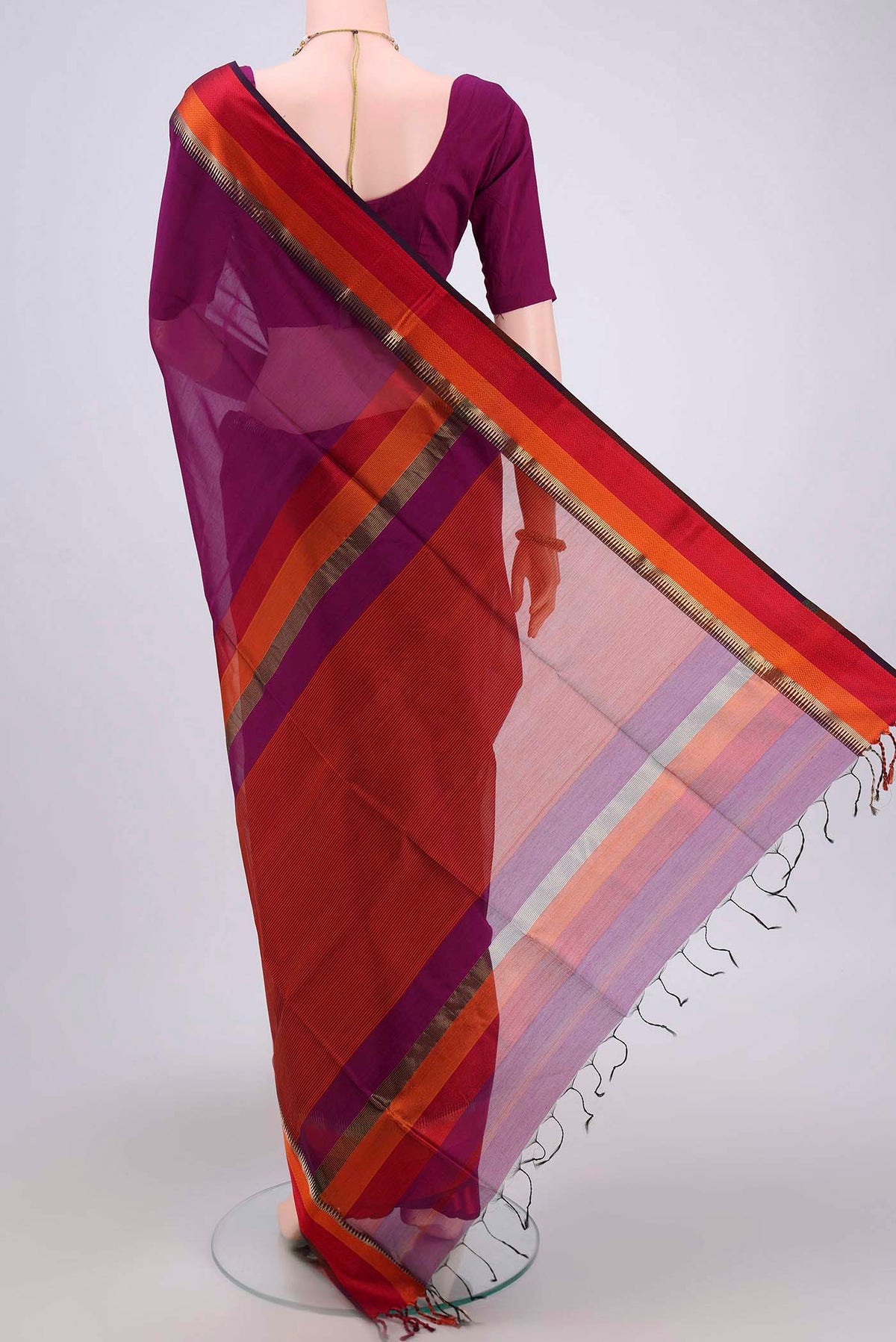 Flat view of Magenta Maheshwari Silk Cotton Saree with Plain Body and Zari Border. 
