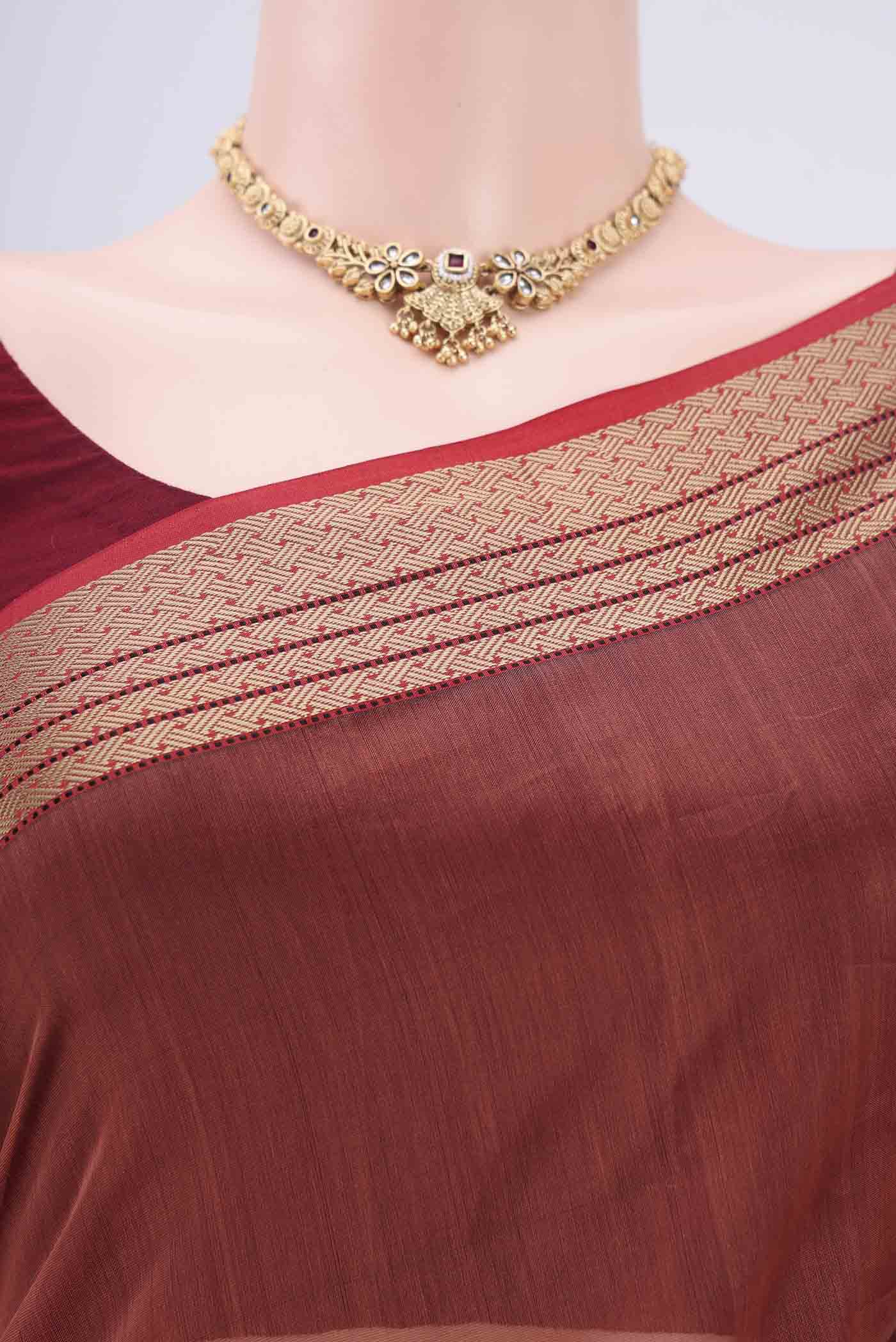 Border image of Brown Maheshwari Silk Cotton Saree with Plain Body and Zari Border. 