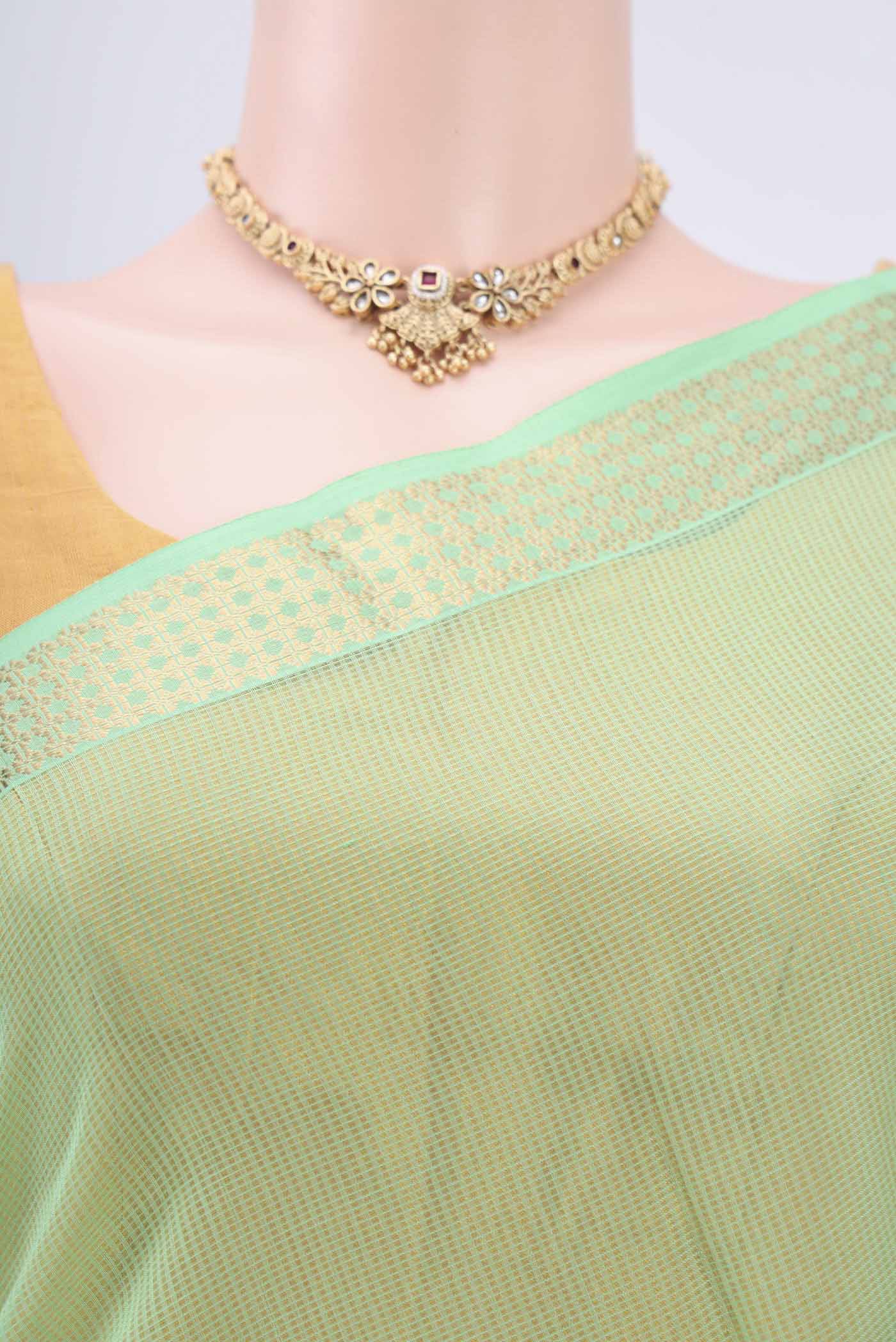 Border image of Light Green Maheshwari Silk Cotton Saree with Plain Body and Zari Border. 