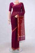 Magenta Maheshwari Silk Cotton Saree with Plain Body and Zari Border.  displayed on a mannequin