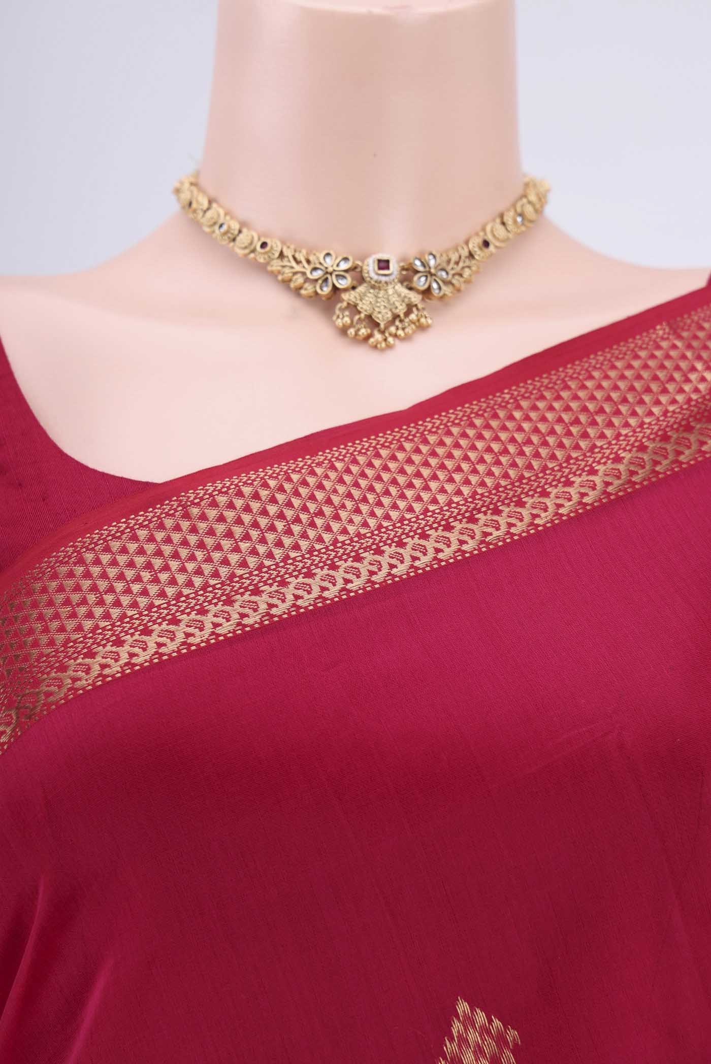 Border image of Pink Maheshwari Silk Cotton Saree with Stripes on the body and Zari Border. 
