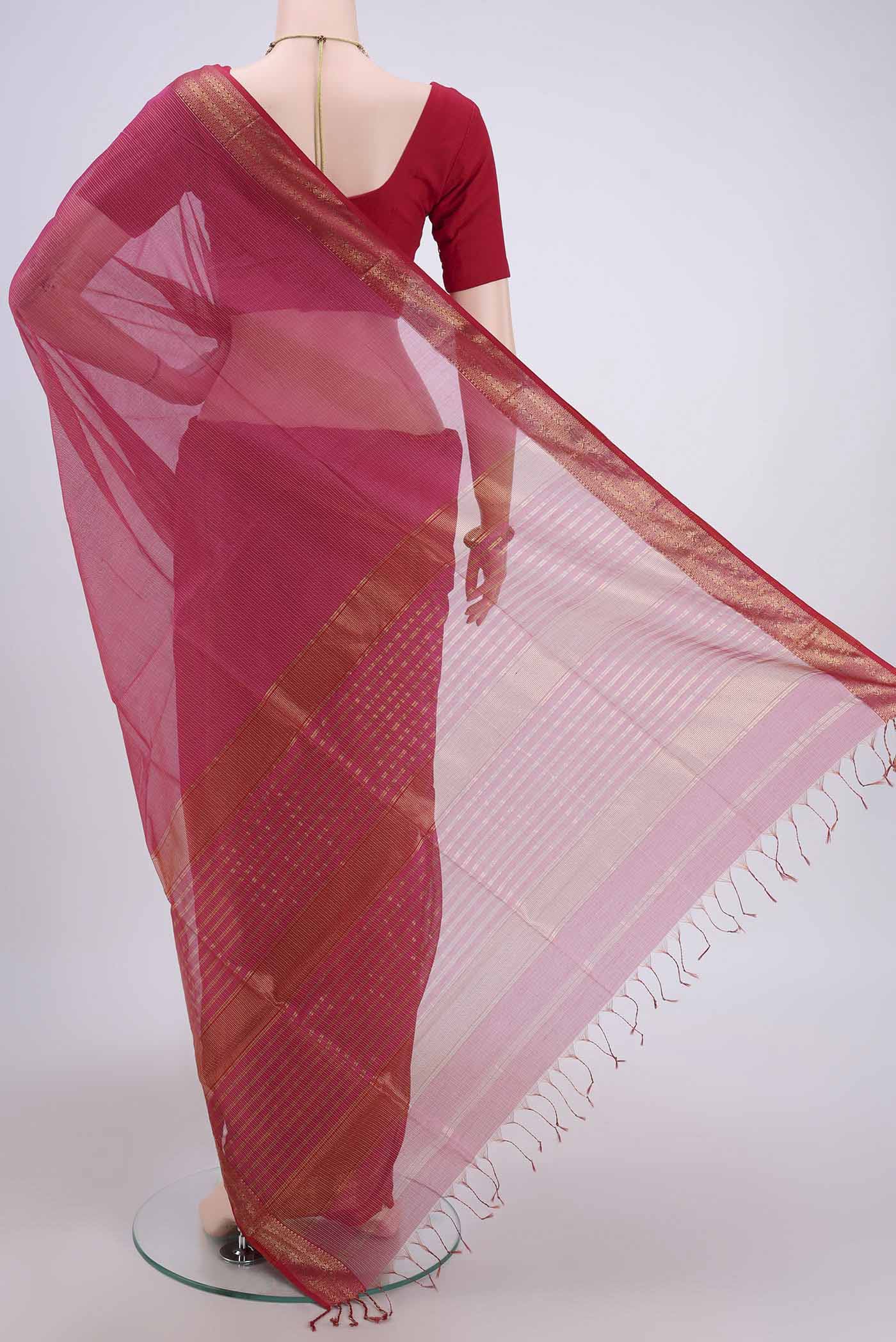 Flat view of Dark Pink Maheshwari Silk Cotton Saree with Stripes on the body and Zari Border. 