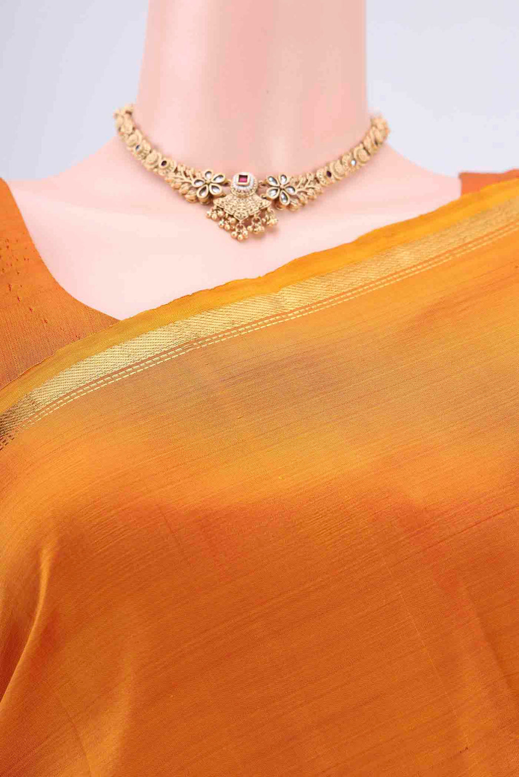 Border image of Mustard Dual Tone Kanjivaram Silk Saree with Plain Body and Zari Border. 