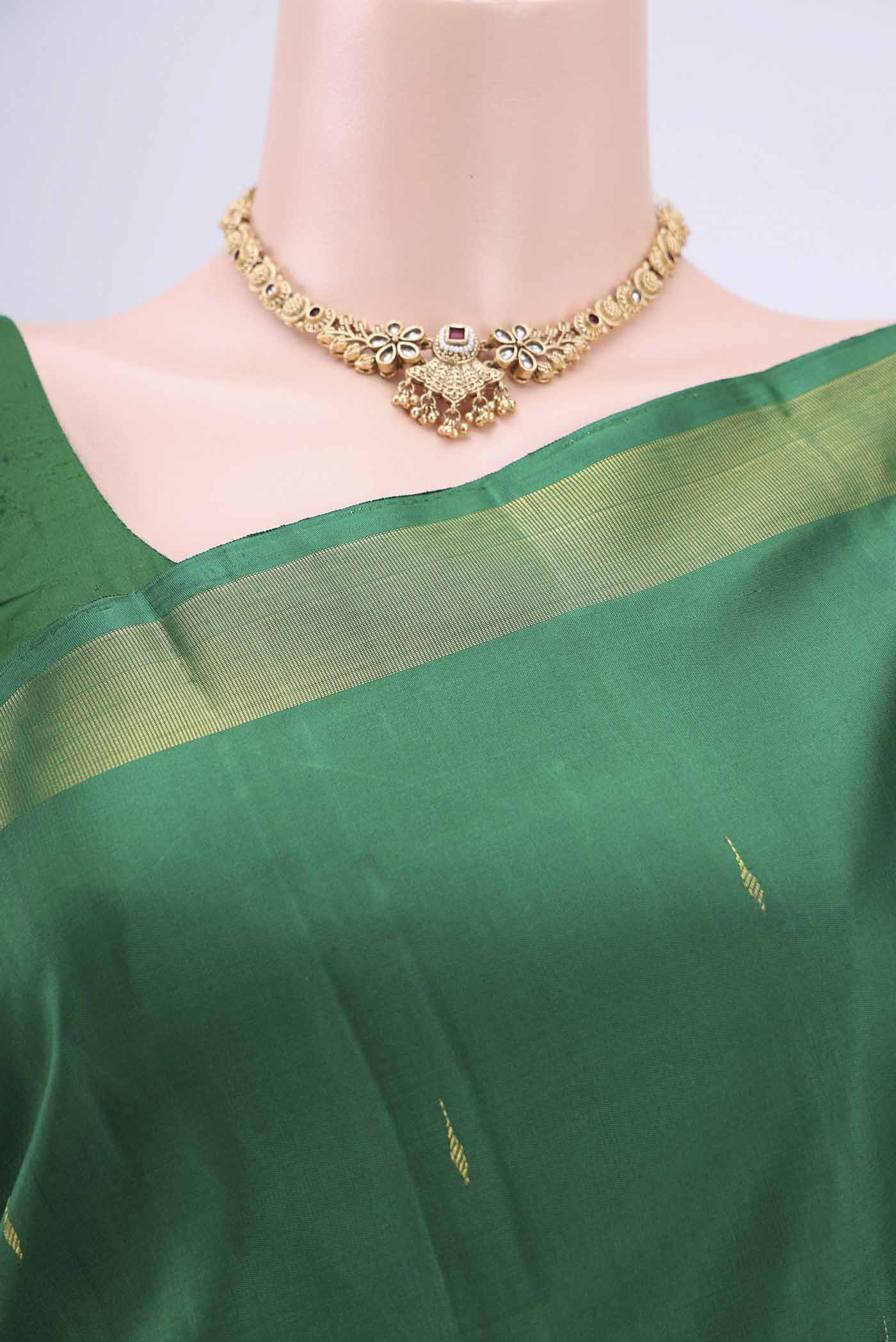 Border image of Green Dual Tone Kanjivaram Silk Saree with Plain Body and Zari Border. 