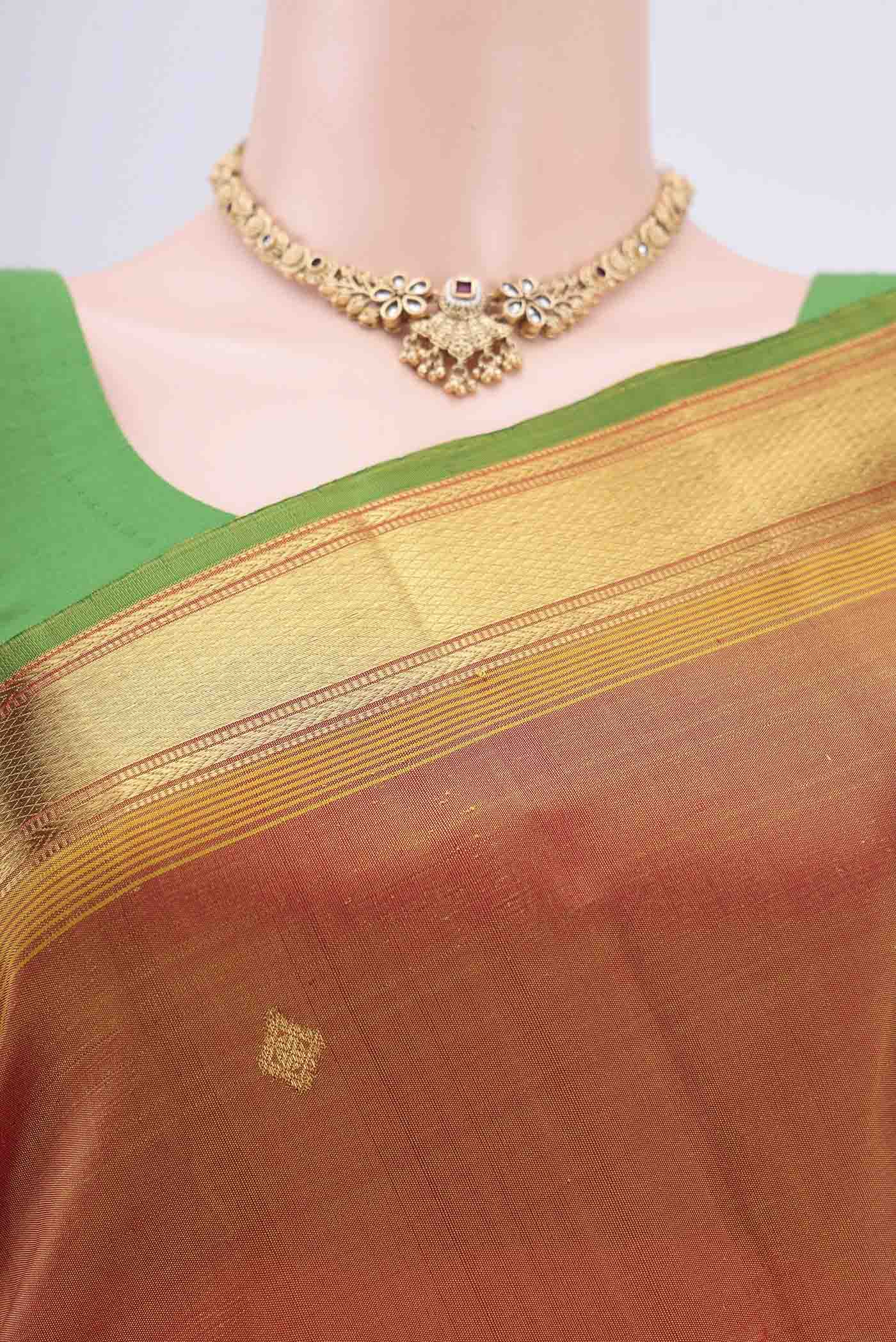 Border image of Blue with Green Dual Tone Kanjivaram Silk Saree with Zari Butta on the body and Zari Border. 