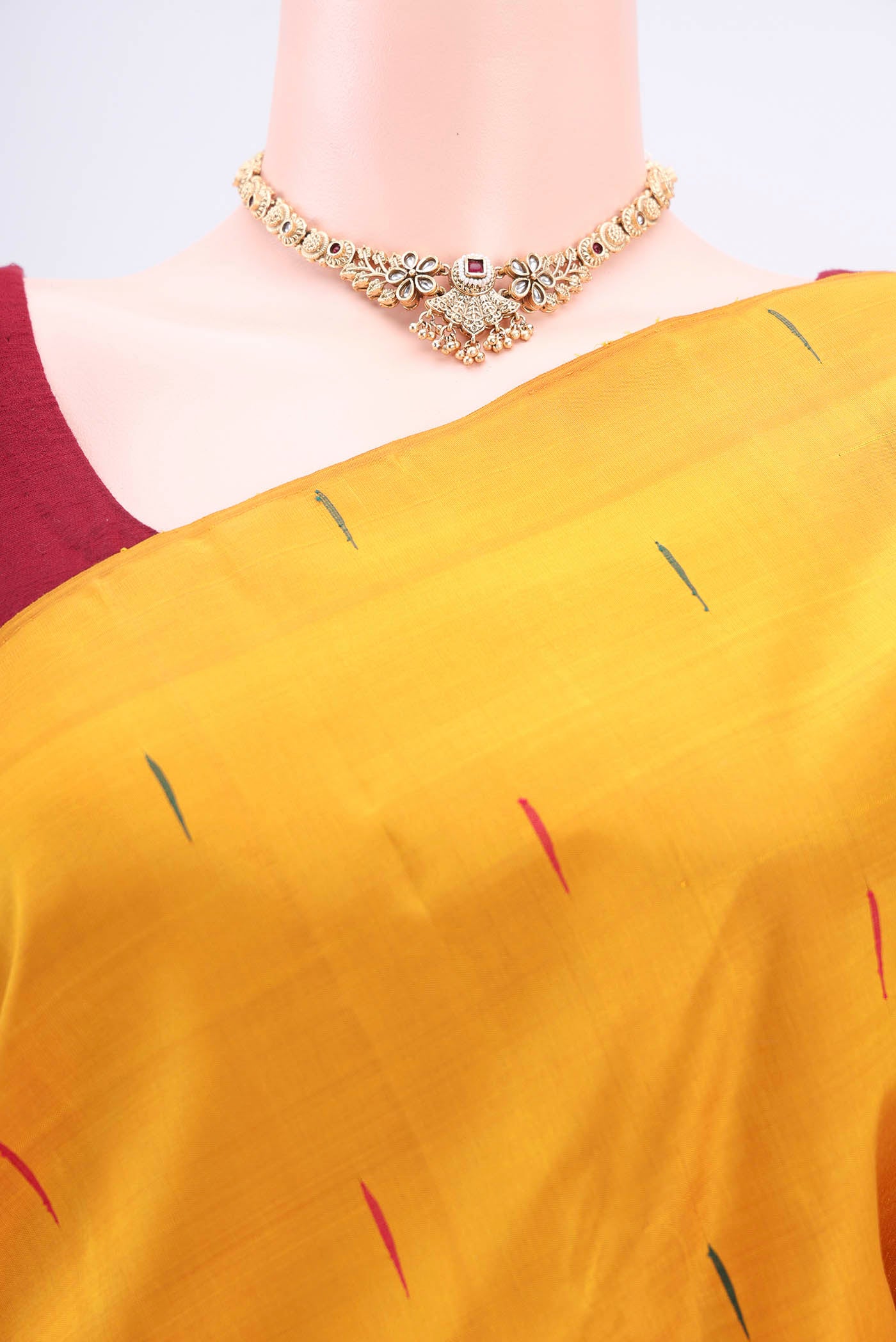 Border image of Mustard Kanchipuram Silk Saree with Thread Butta on the body and Plain Border. 