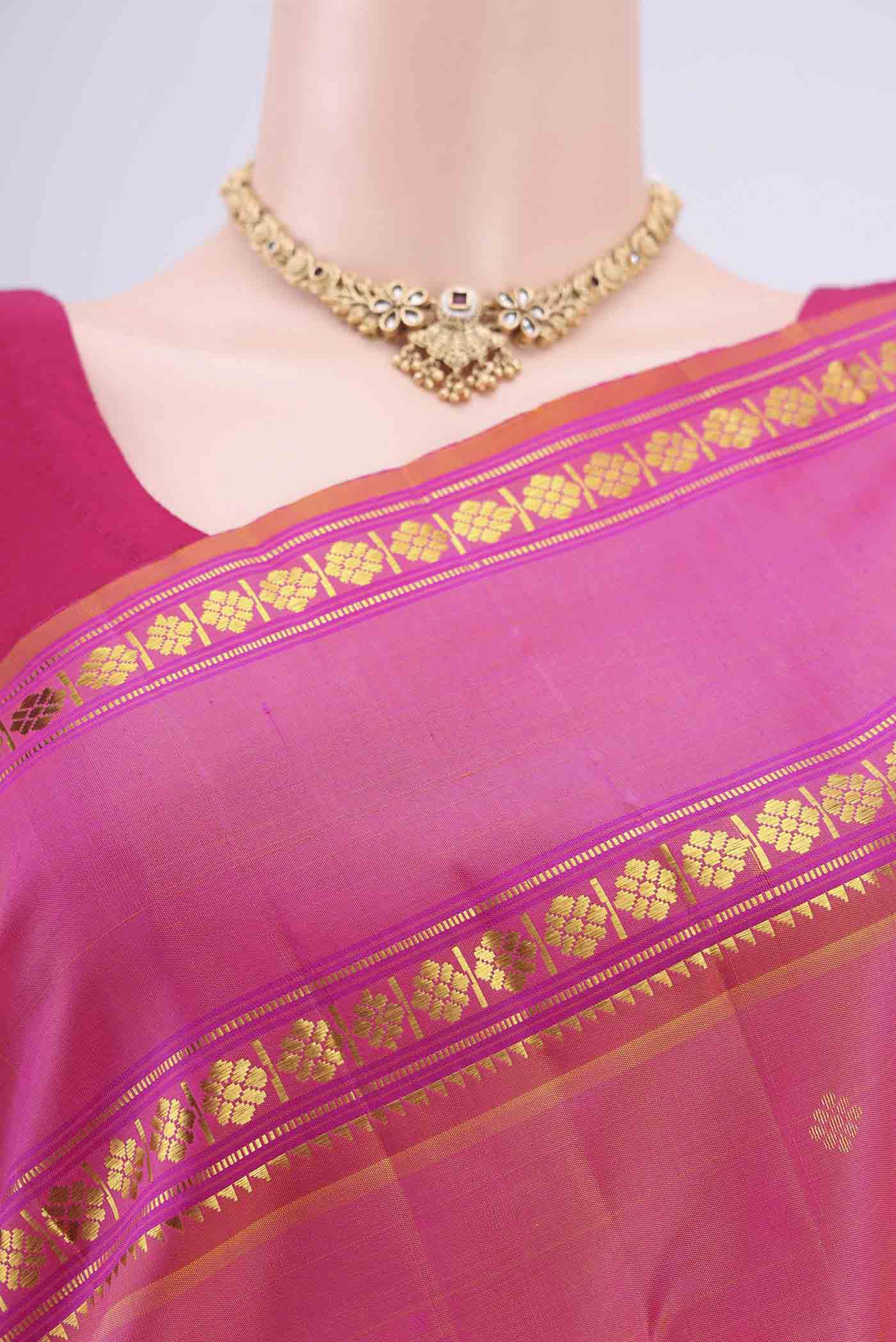 Border image of Pink Dual Tone Kanchipuram Silk Saree with Zari Butta on the body and Zari Border. 