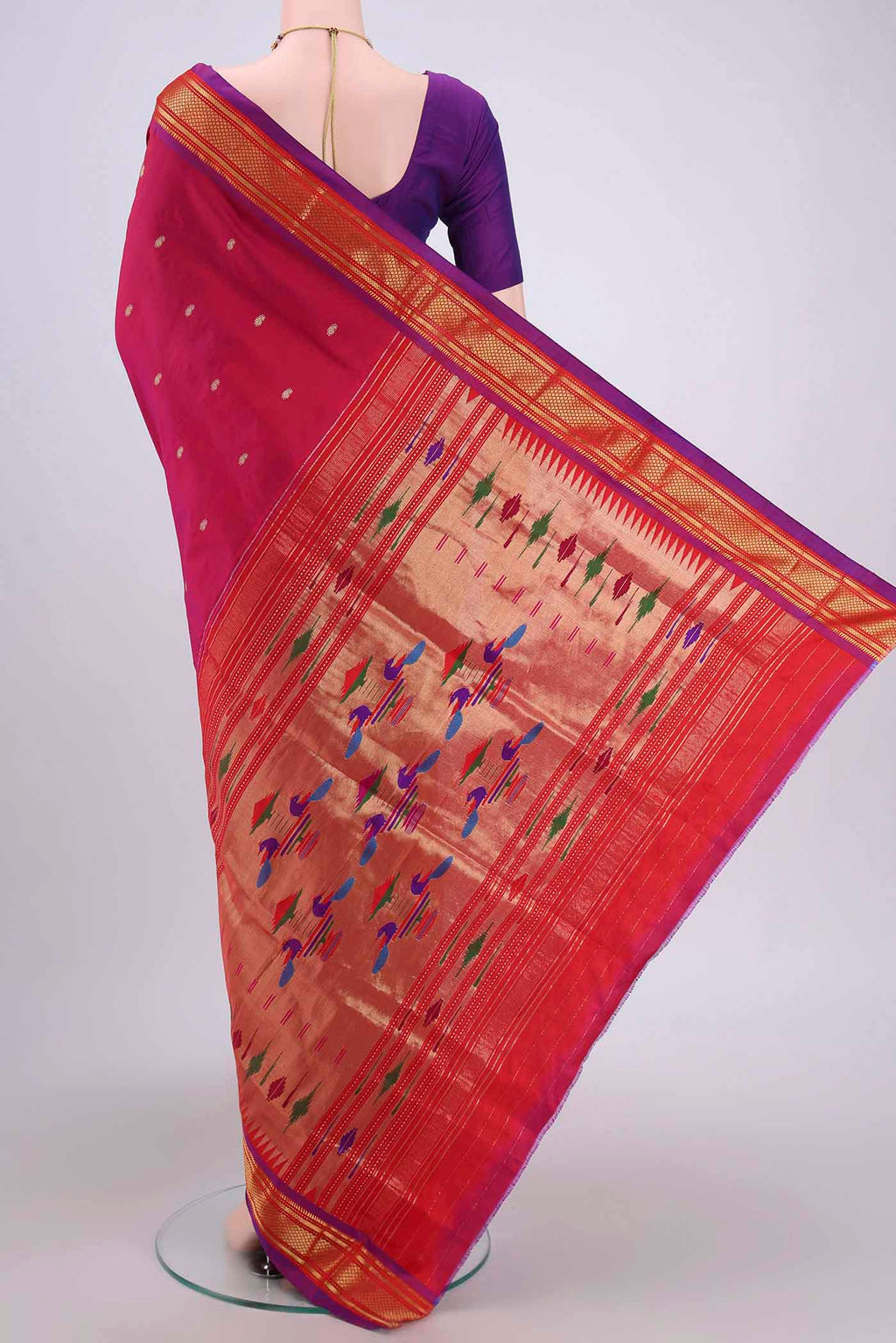 Flat view of Pink Soft Silk Saree with Zari Butta on the body and Zari Border. 