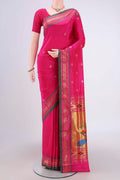 Rani Pink Soft Silk Saree with Zari Butta on the body and Zari Border.  displayed on a mannequin