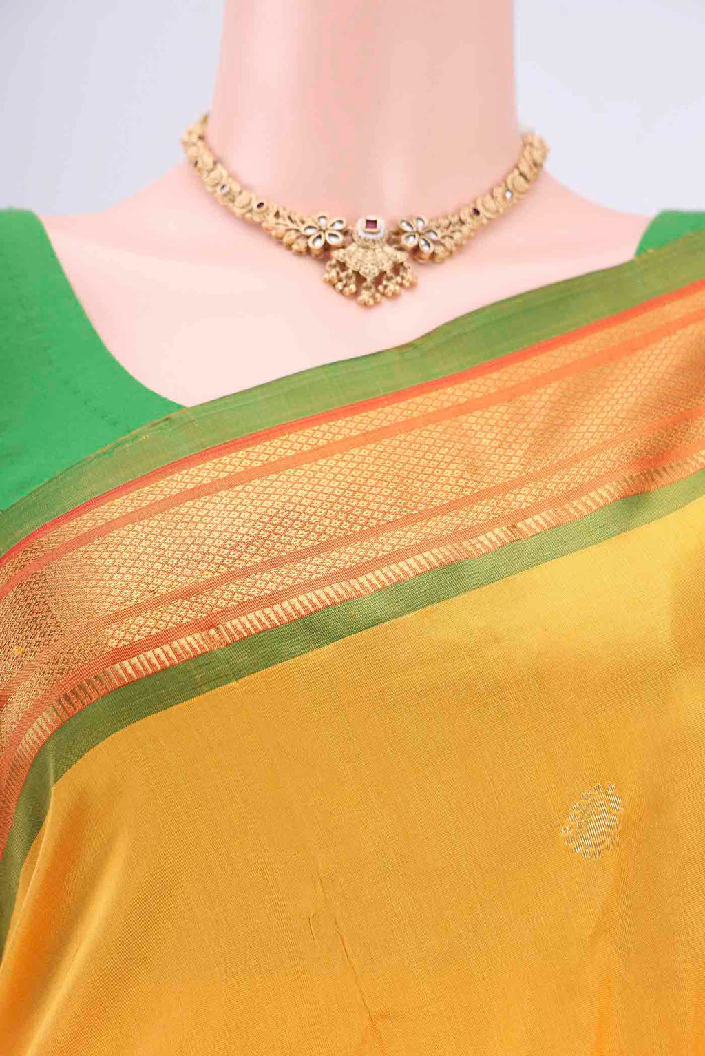 Border image of Yellow Soft Silk Saree with Zari Butta on the body and Zari Border. 
