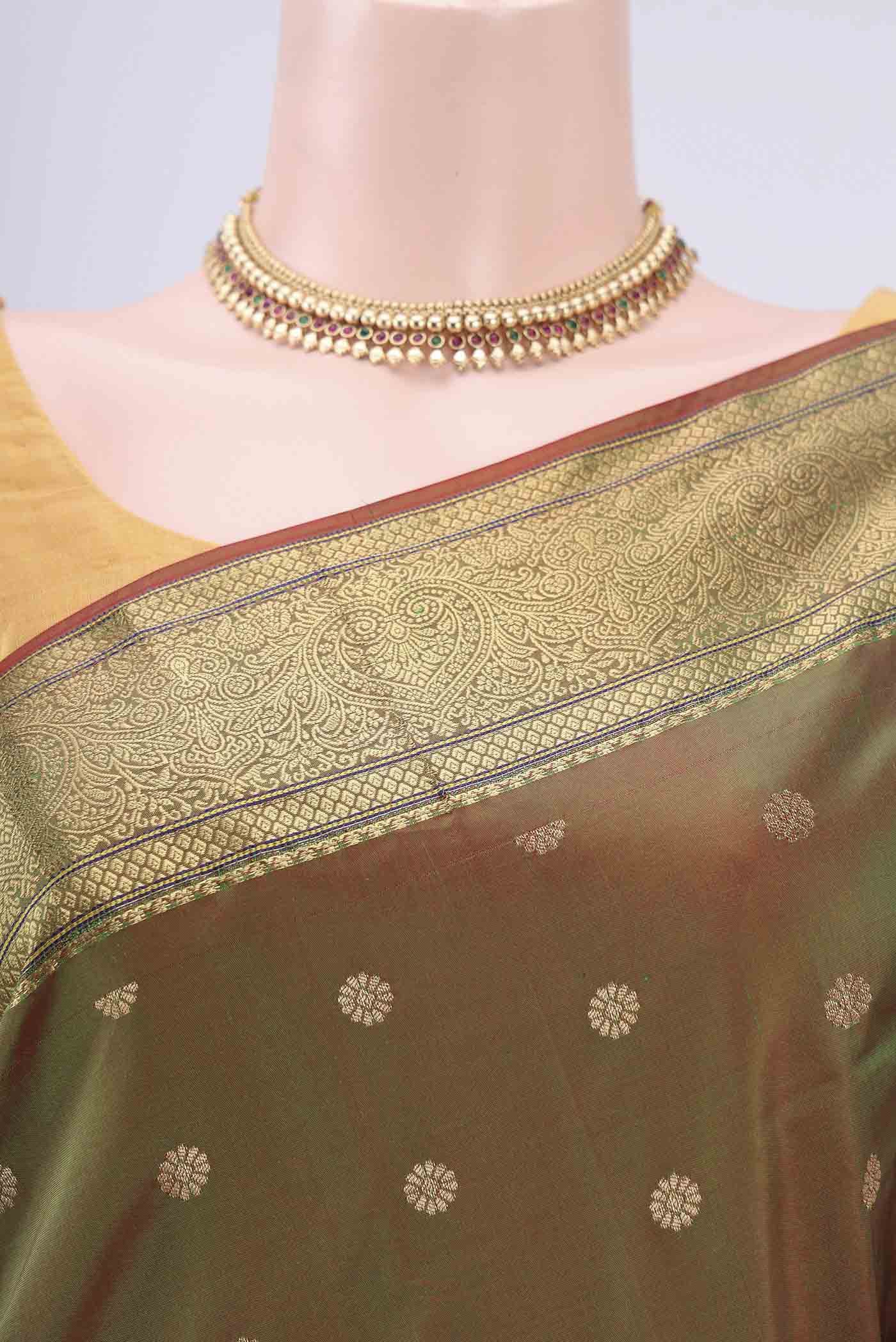 Border image of Light Green Blended Bangalore Silk Saree with Zari Butta on the body and Zari Border. 