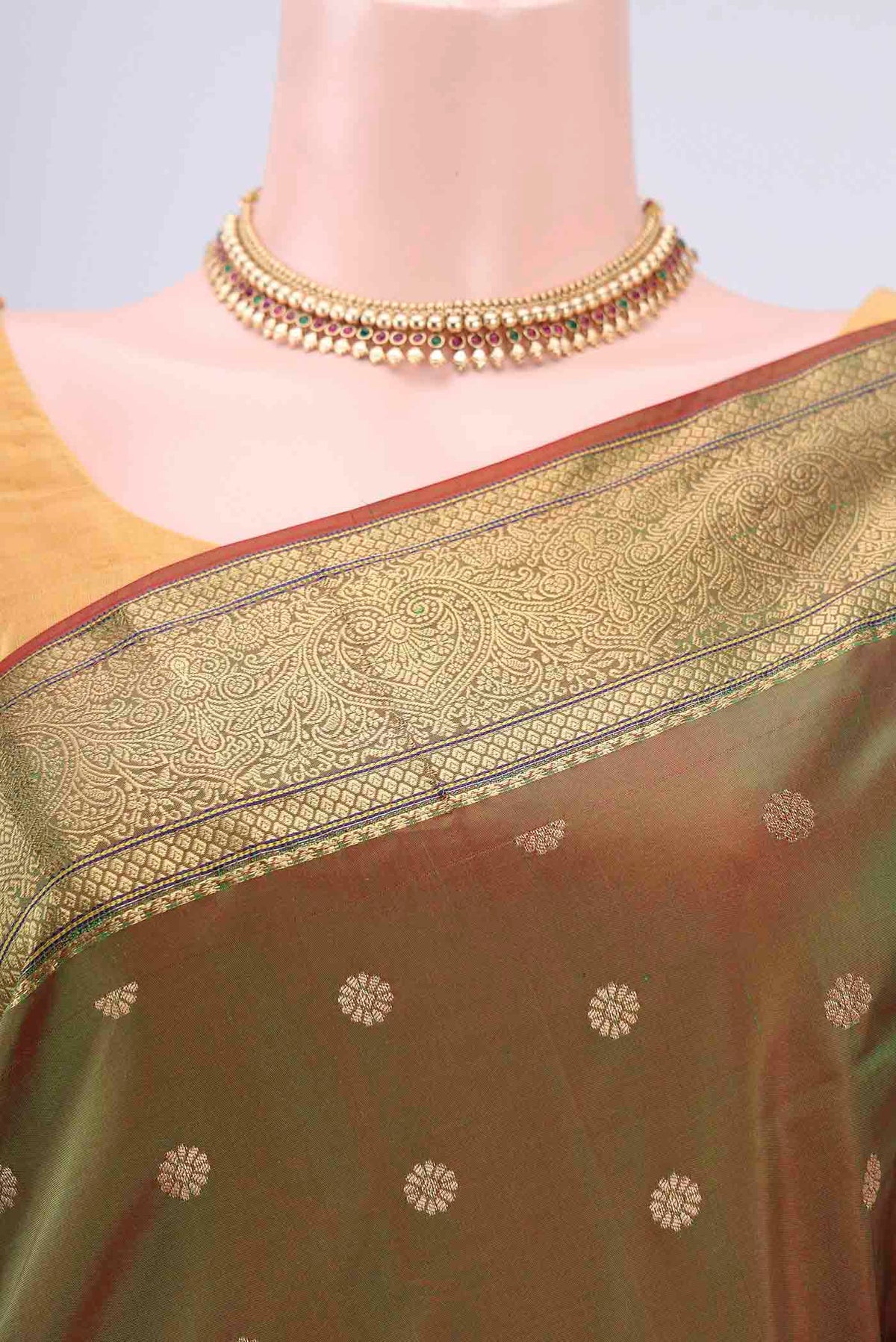 Border image of Light Green Blended Bangalore Silk Saree with Zari Butta on the body and Zari Border. 