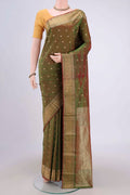 Light Green Blended Bangalore Silk Saree with Zari Butta on the body and Zari Border.  displayed on a mannequin