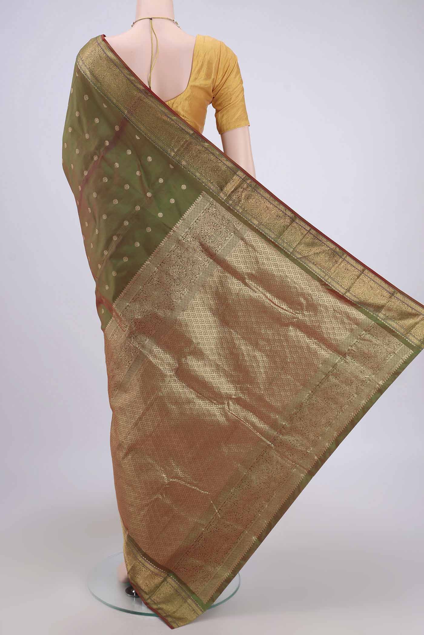 Flat view of Light Green Blended Bangalore Silk Saree with Zari Butta on the body and Zari Border. 