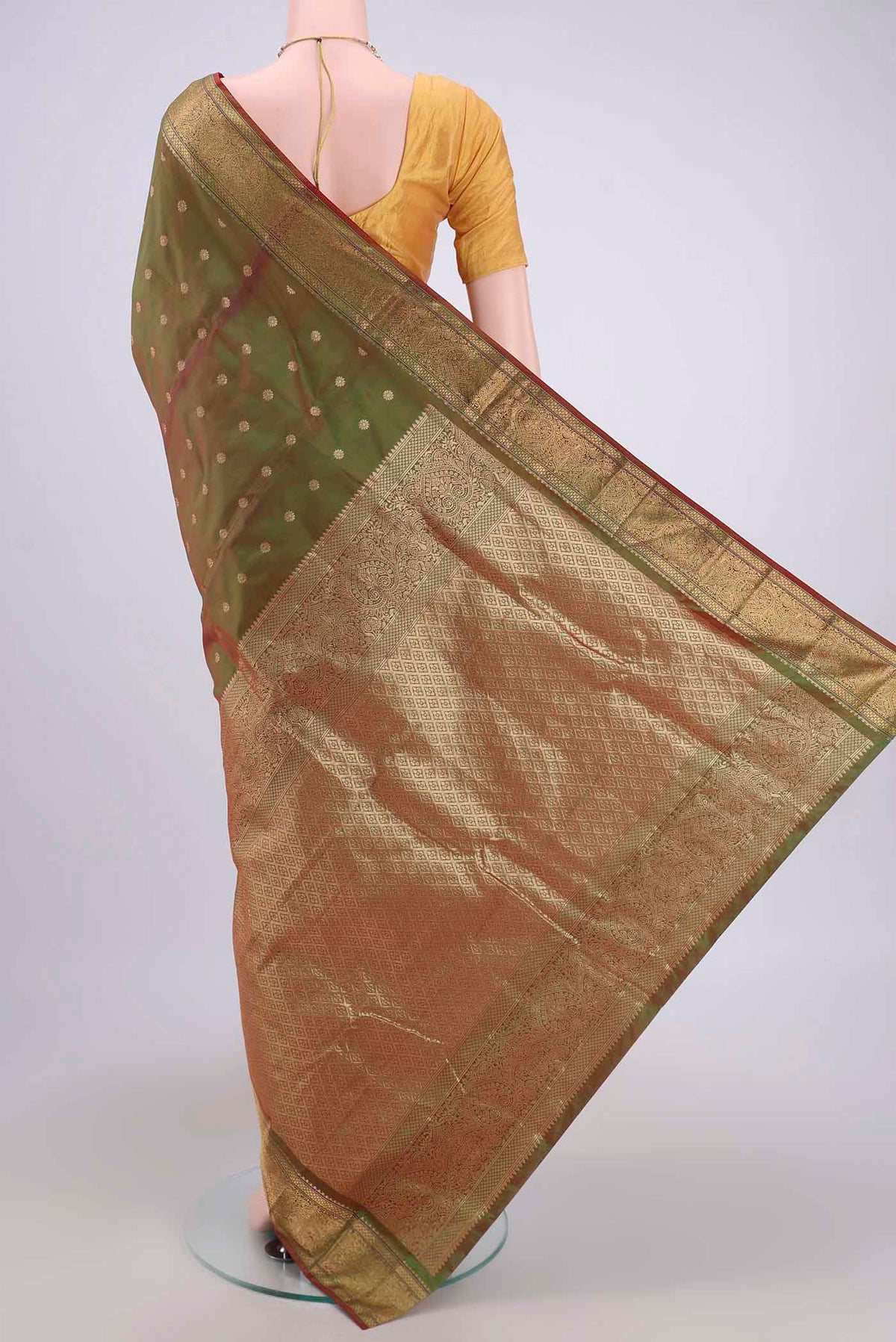 Flat view of Light Green Blended Bangalore Silk Saree with Zari Butta on the body and Zari Border. 