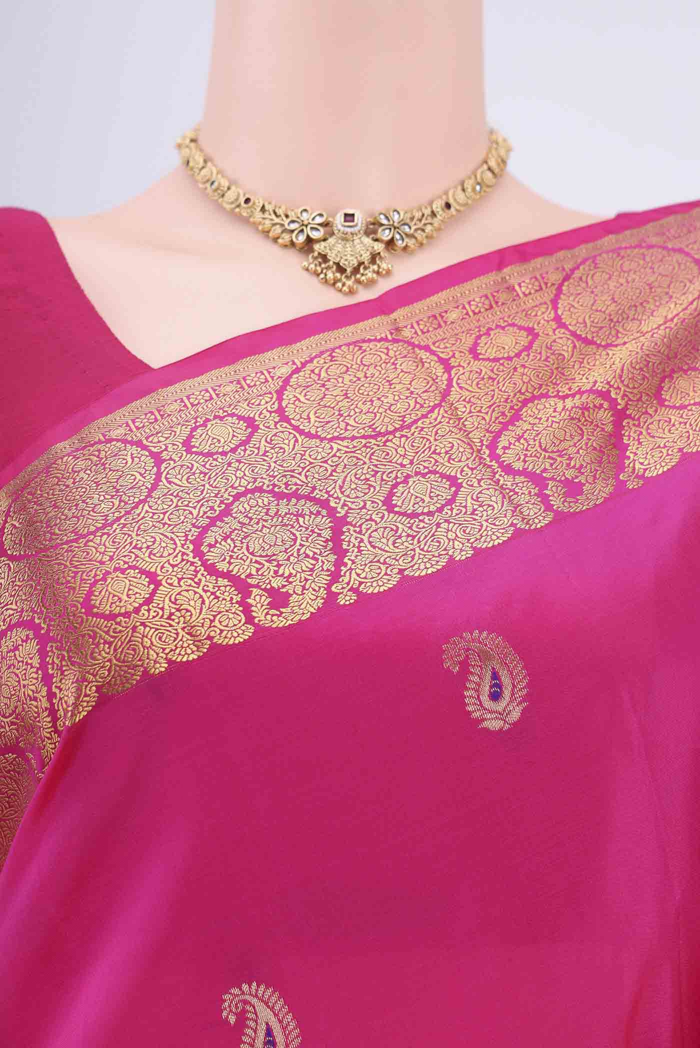 Border image of Rani Pink Blended Bangalore Silk Saree with Zari Butta on the body and Zari Border. 