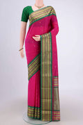 Rani Pink Blended Bangalore Silk Saree with Zari Butta on the body and Zari Border.  displayed on a mannequin