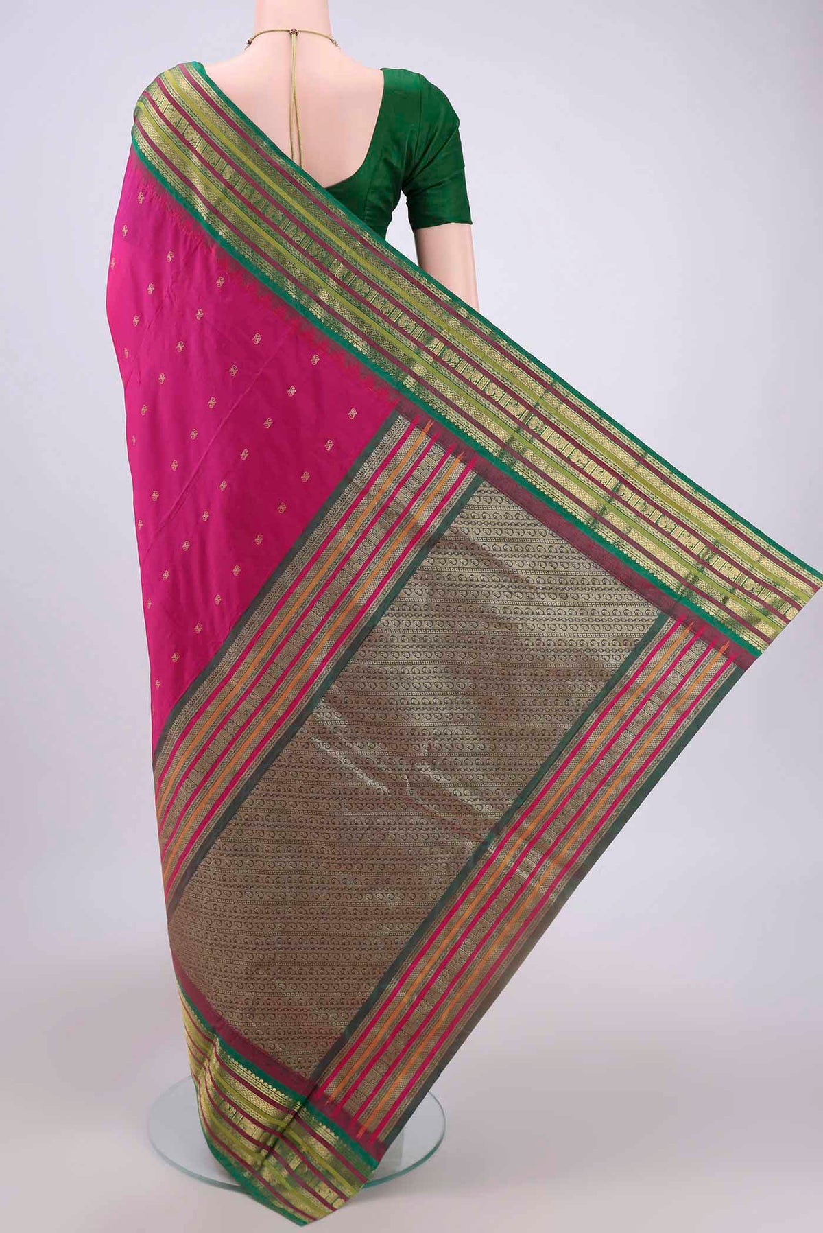 Flat view of Rani Pink Blended Bangalore Silk Saree with Zari Butta on the body and Zari Border. 